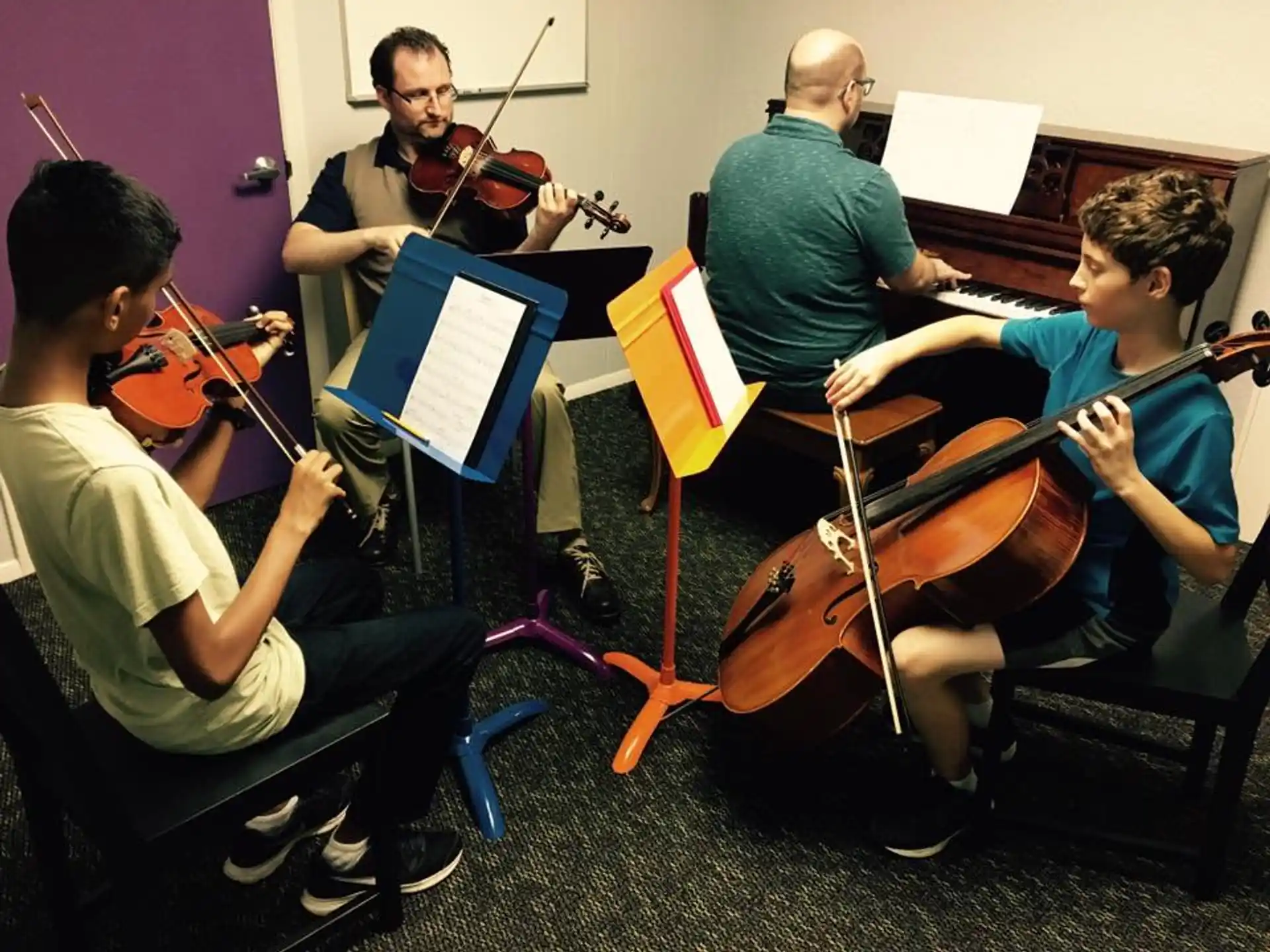 a group of people playing instruments