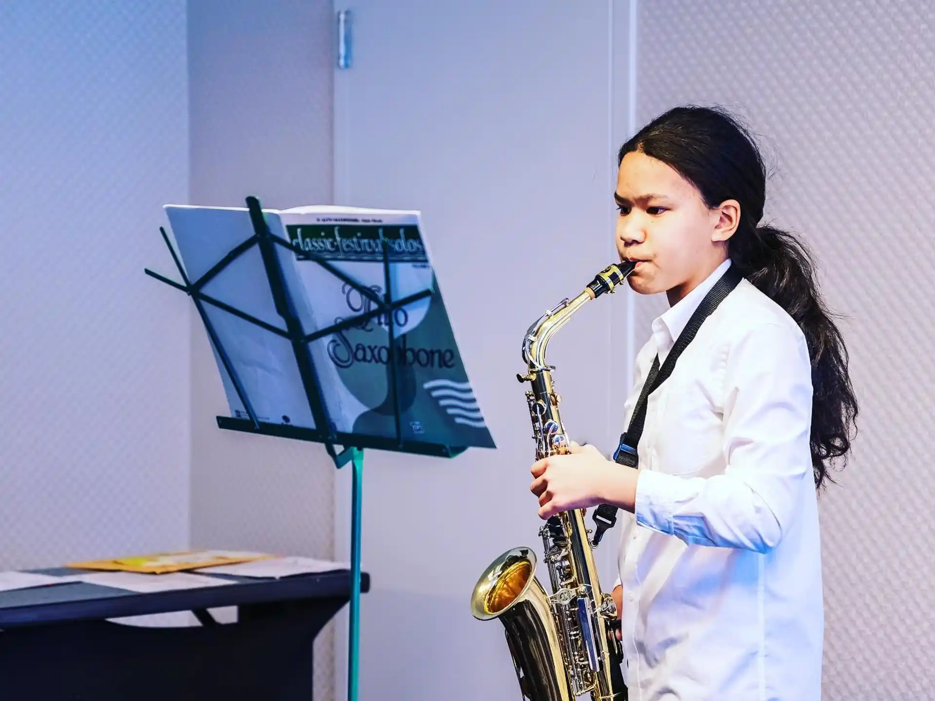 a person playing a saxophone