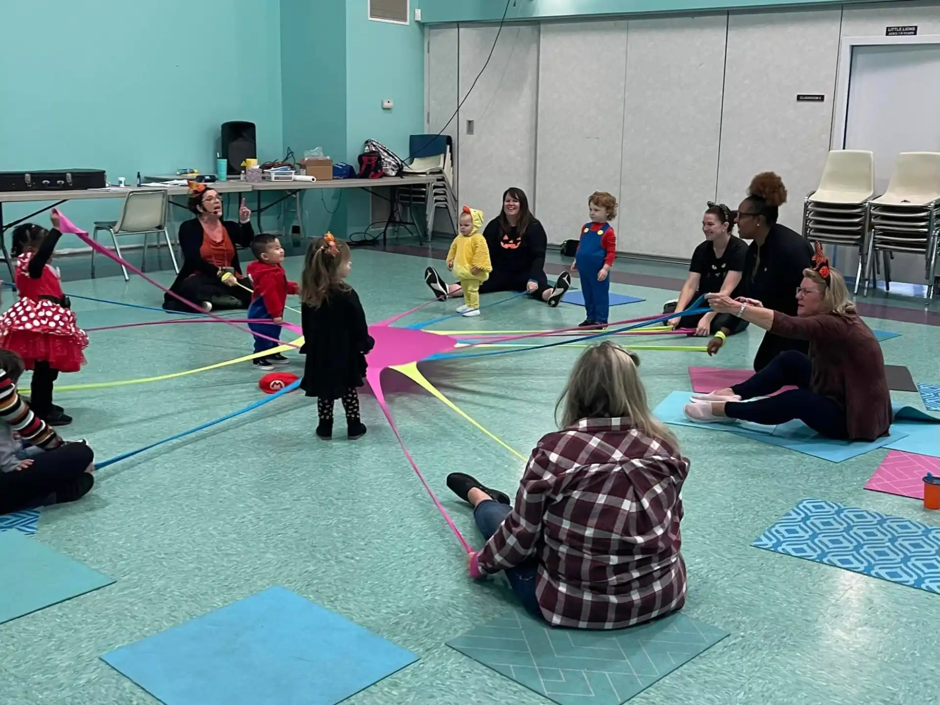 a group of people sitting on the floor