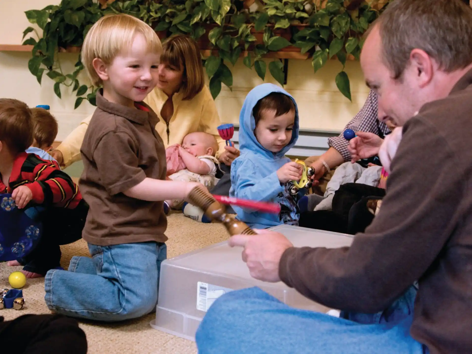 a person and a group of children