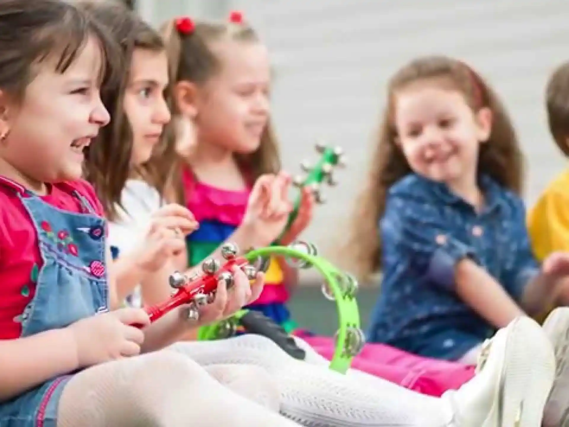 a group of children playing with a toy
