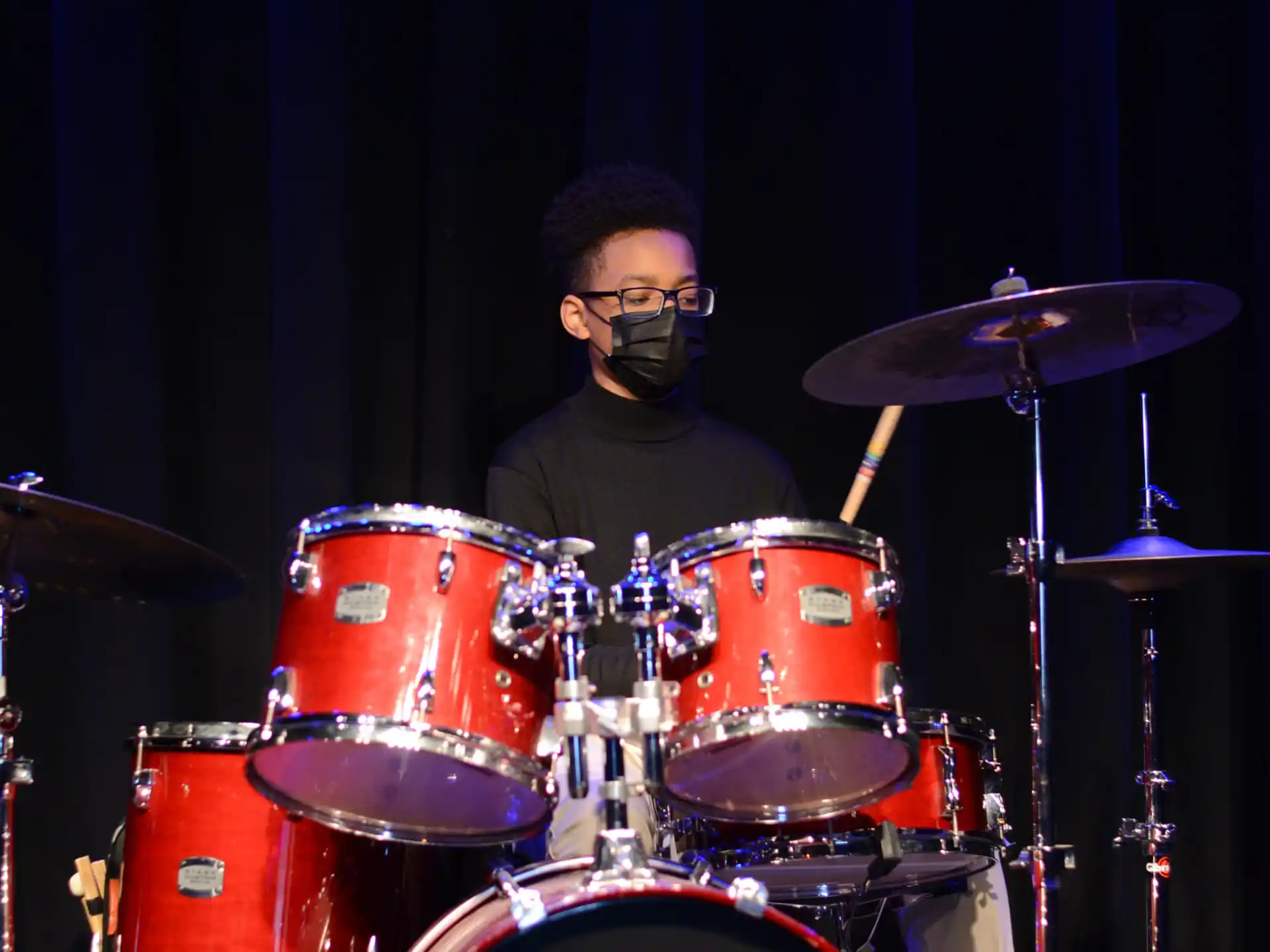 a man playing drums