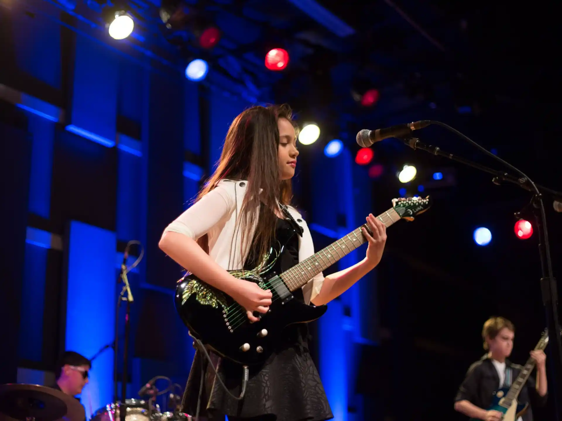 a person playing a guitar