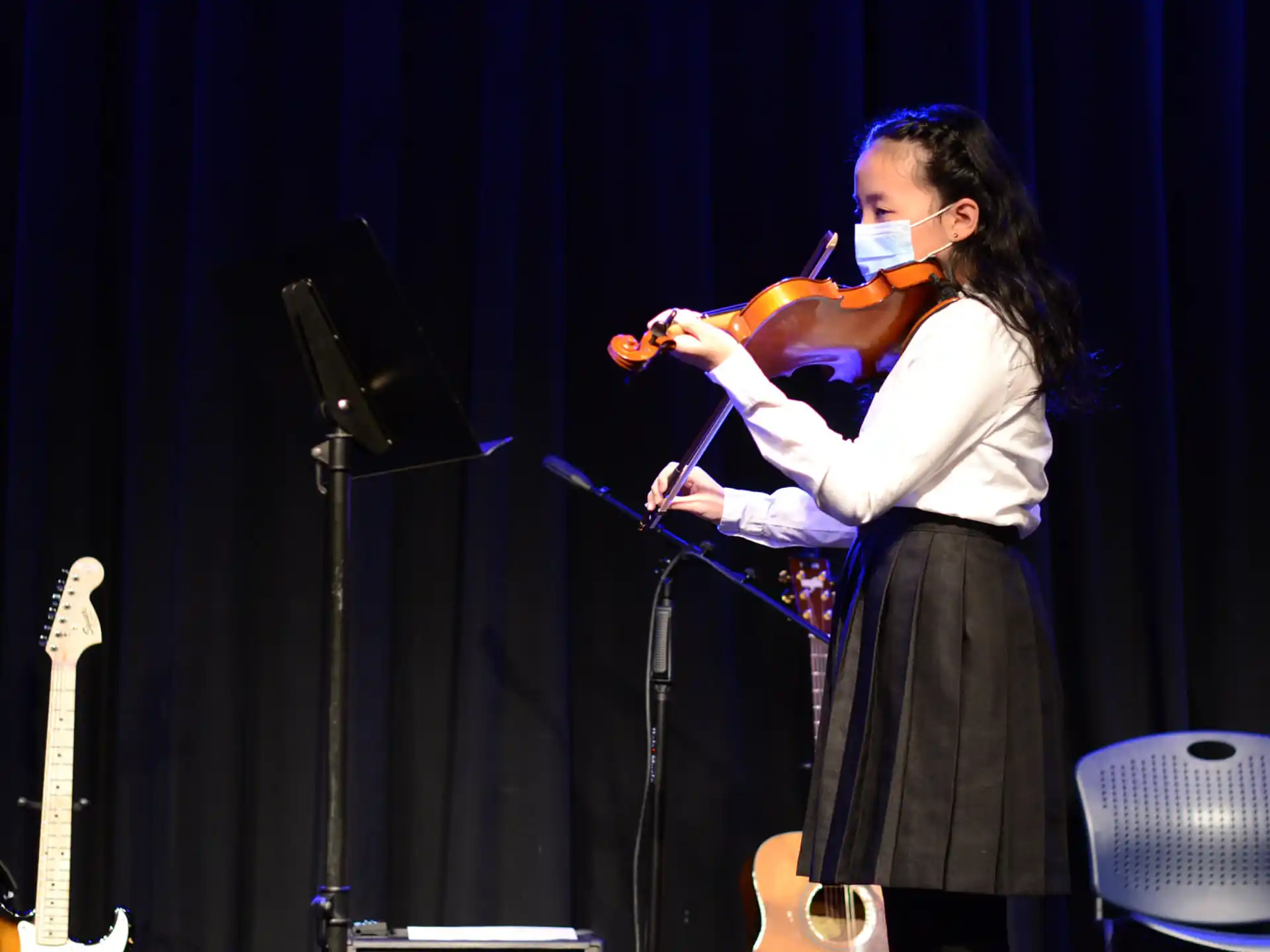a person playing a violin