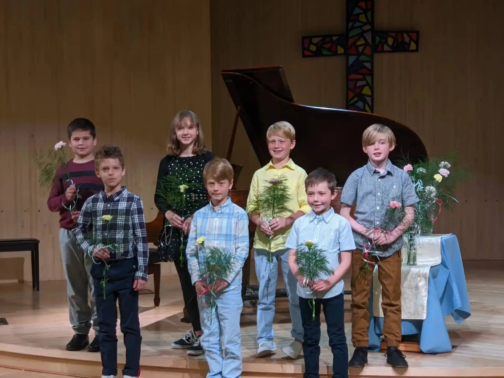 a group of children posing for a photo
