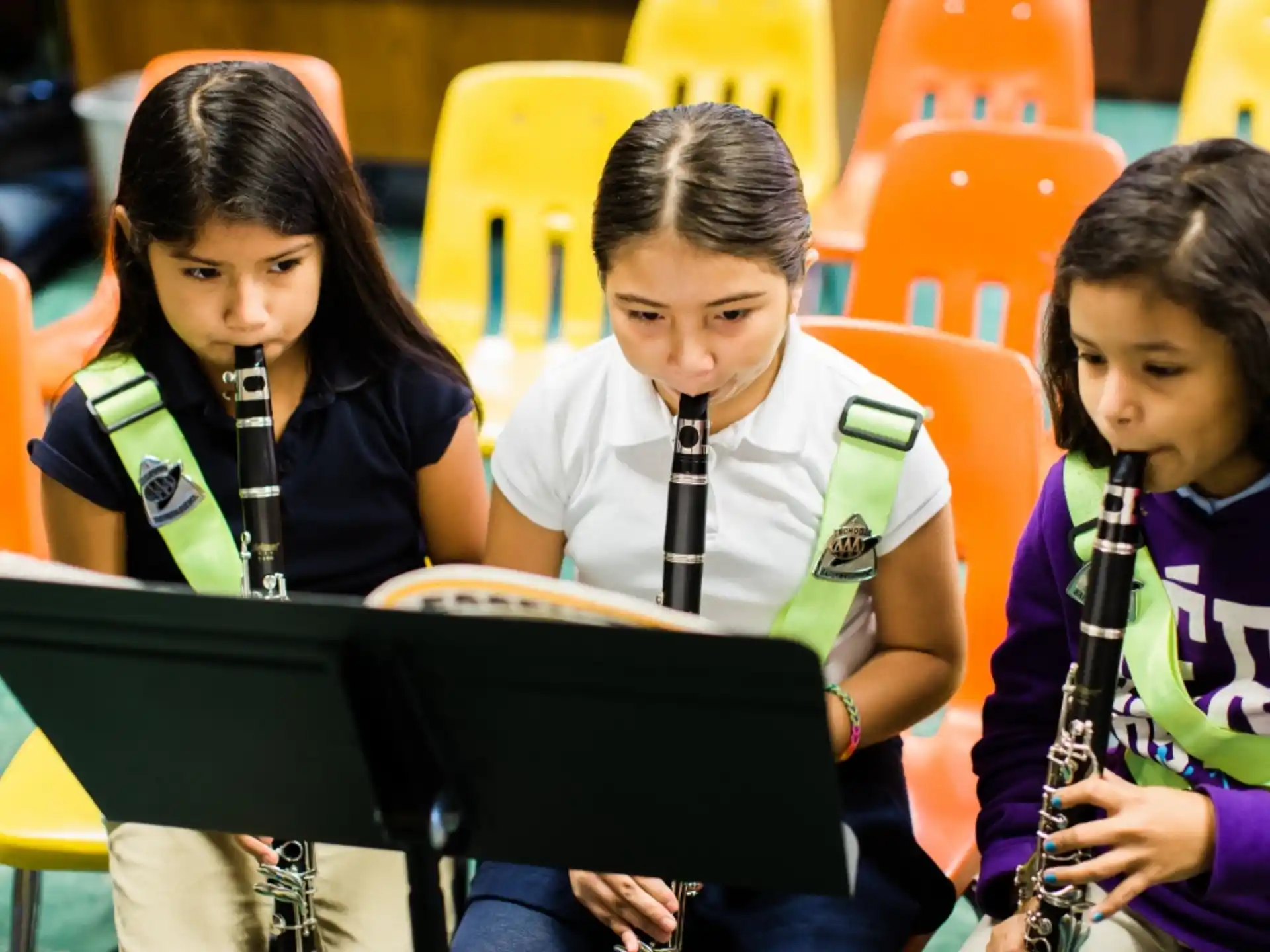 a group of girls playing musical instruments