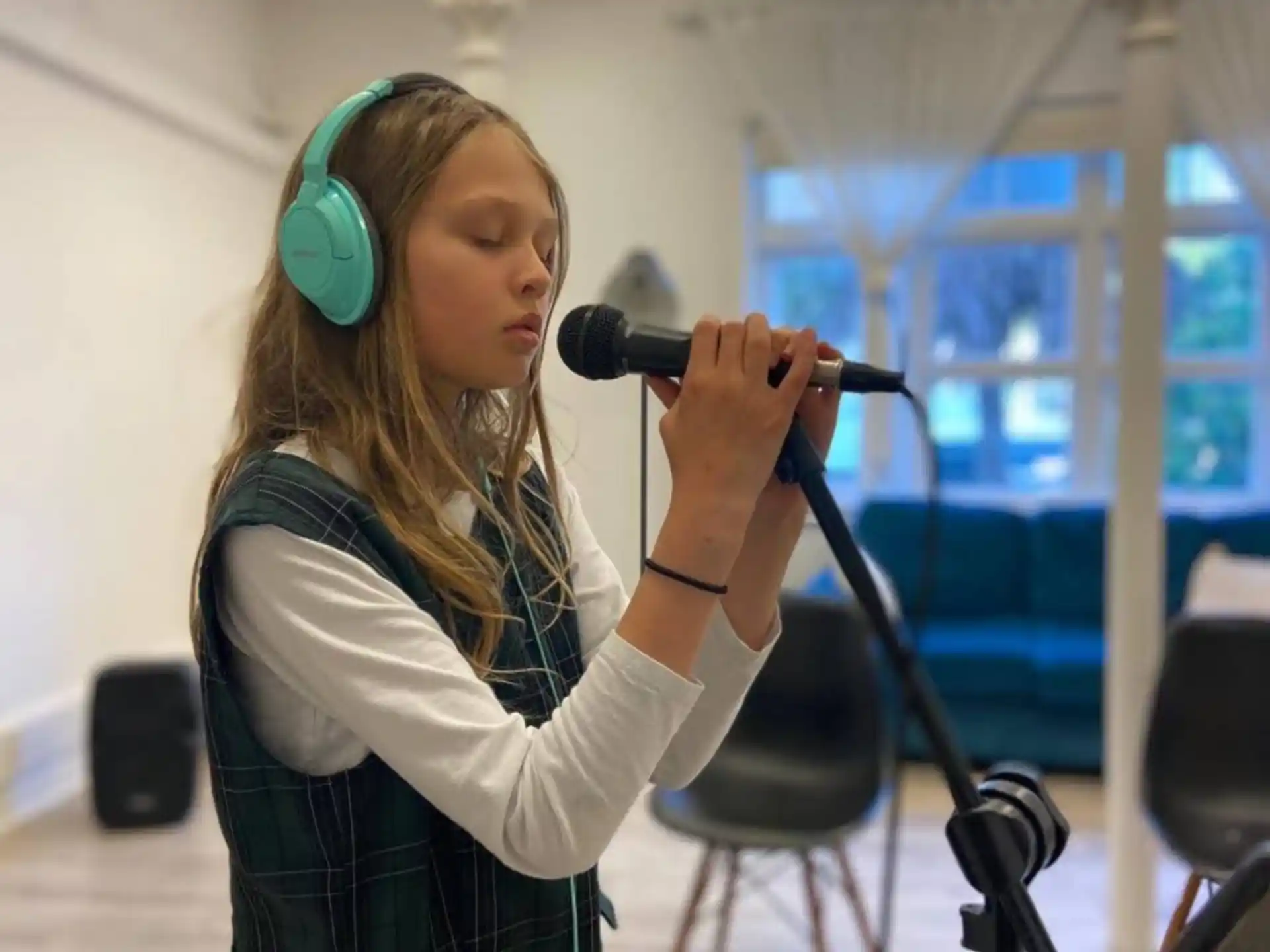 a woman with a microphone
