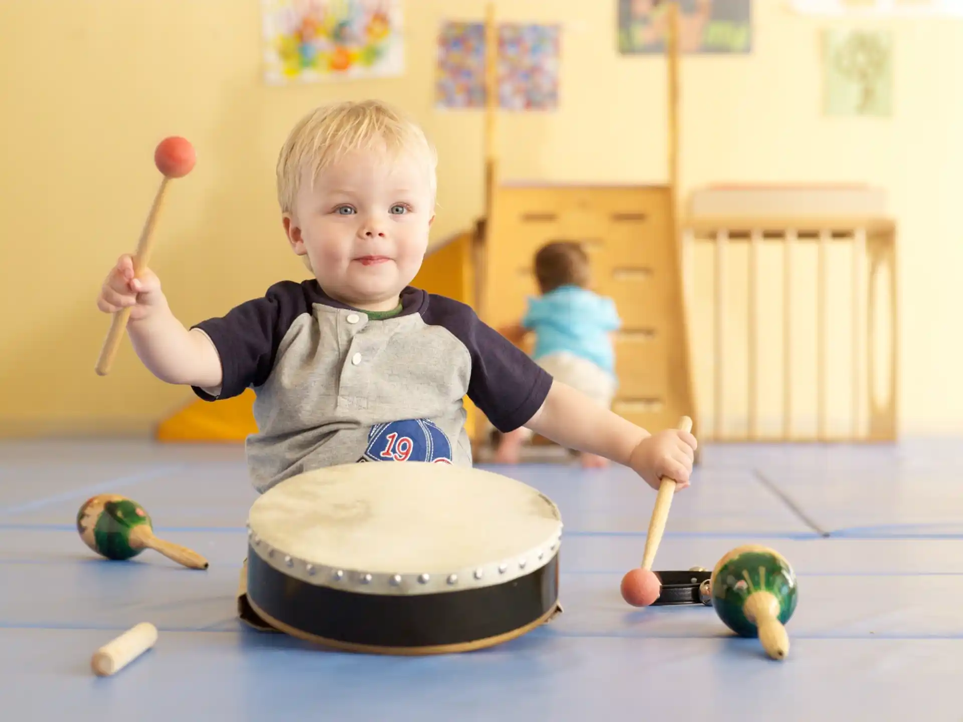 a boy playing with toys