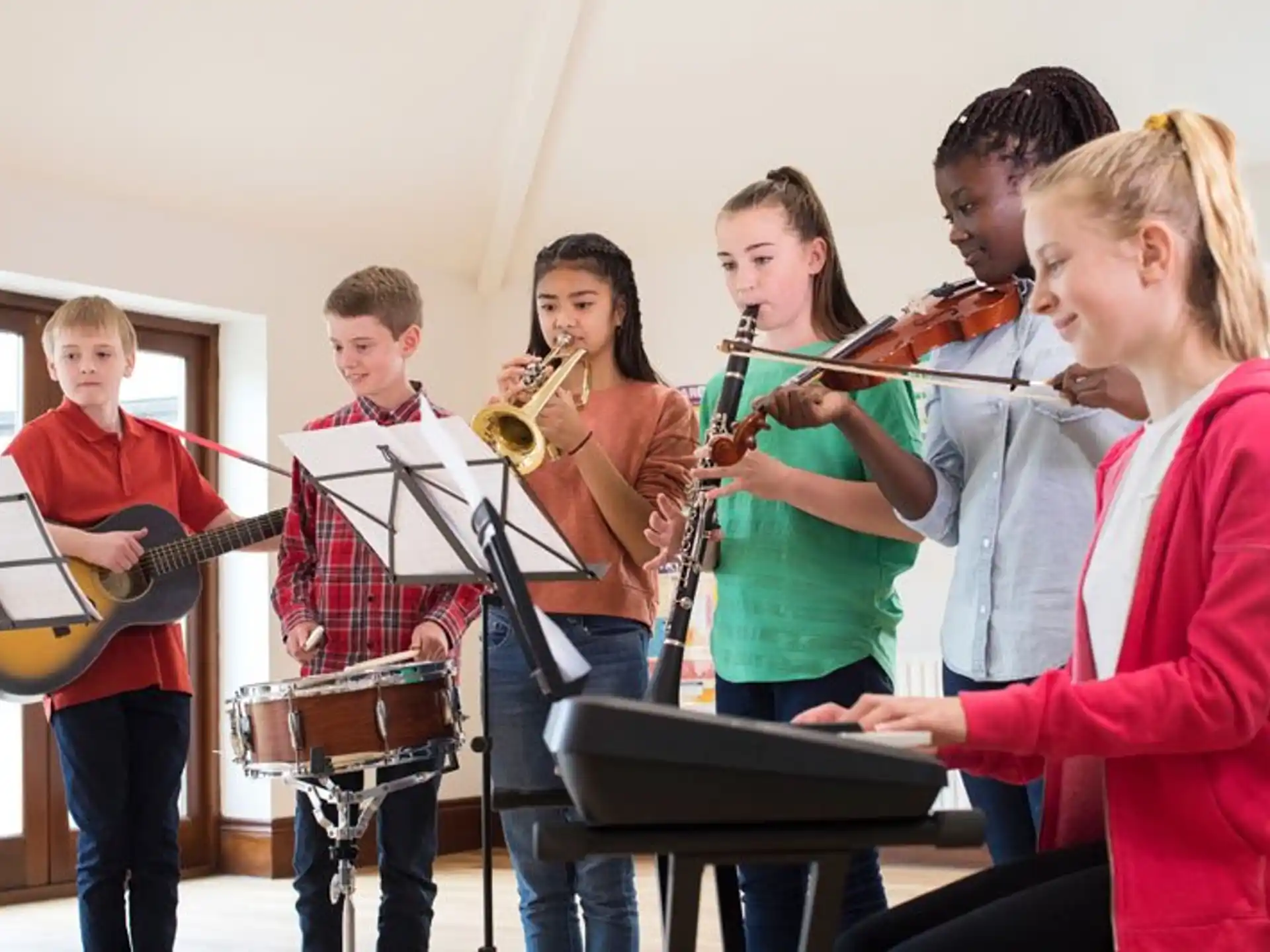 a group of people playing instruments