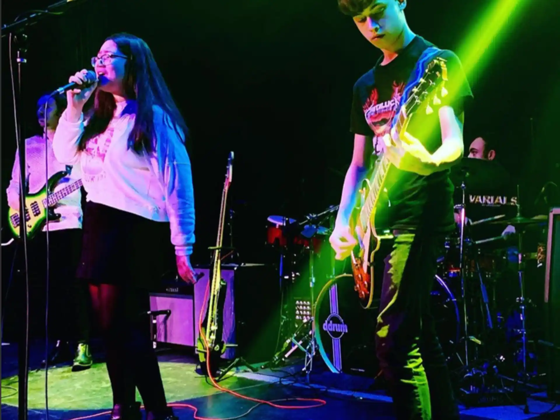 a man and woman on a stage