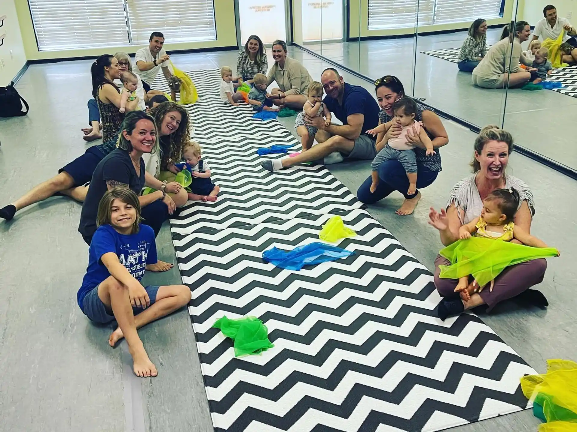 a group of people sitting on the floor