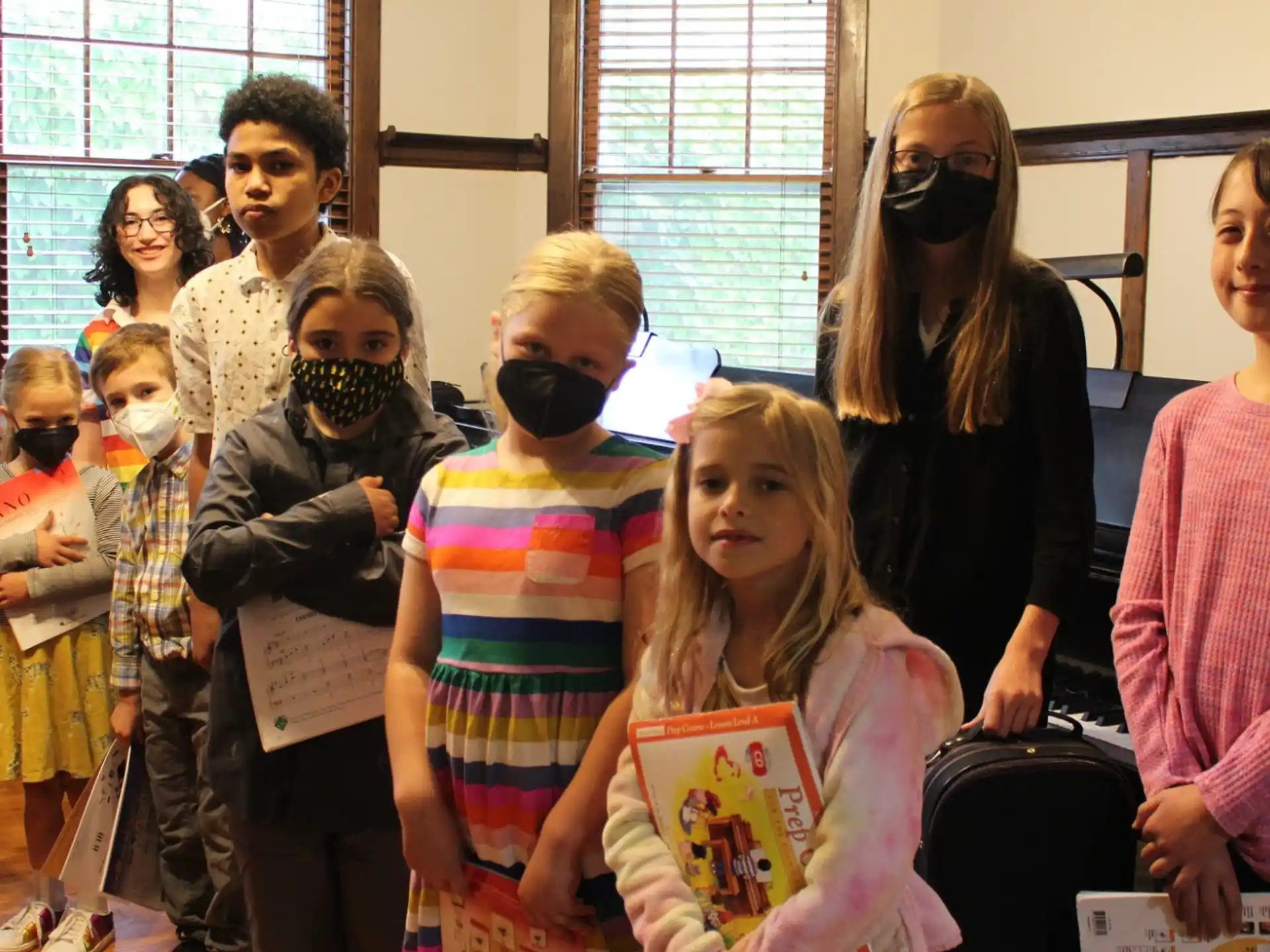 a group of people standing in a room