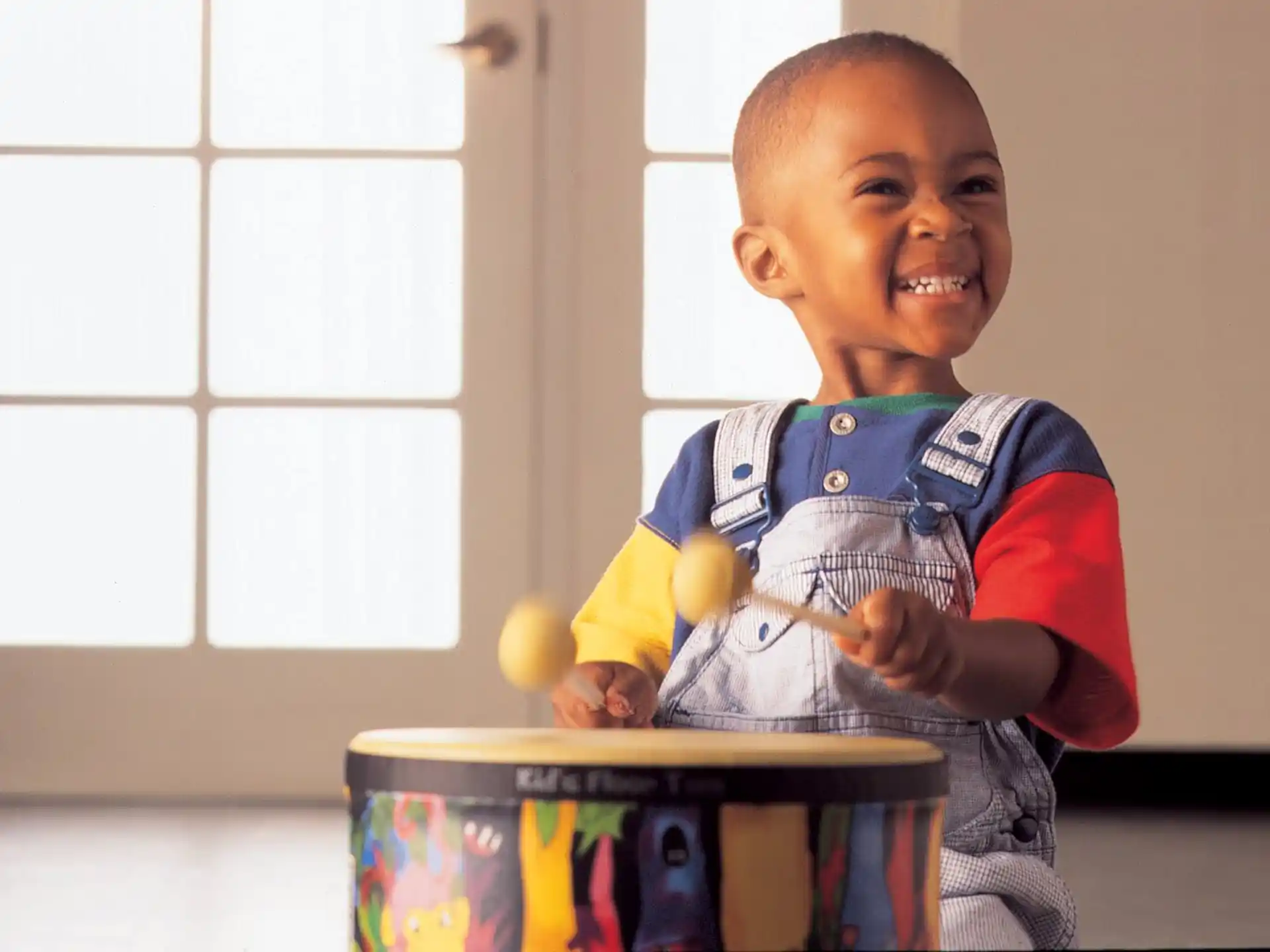a child holding a toy