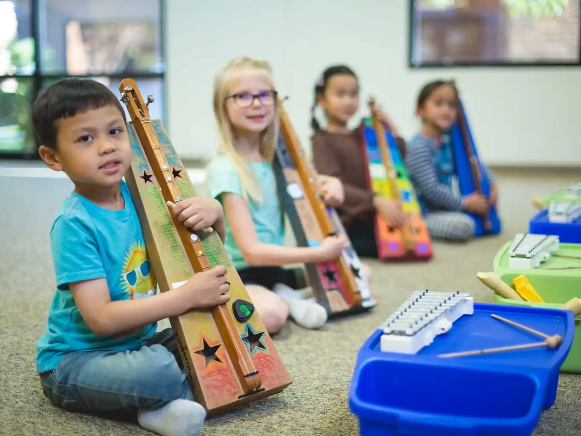 a group of kids playing instruments