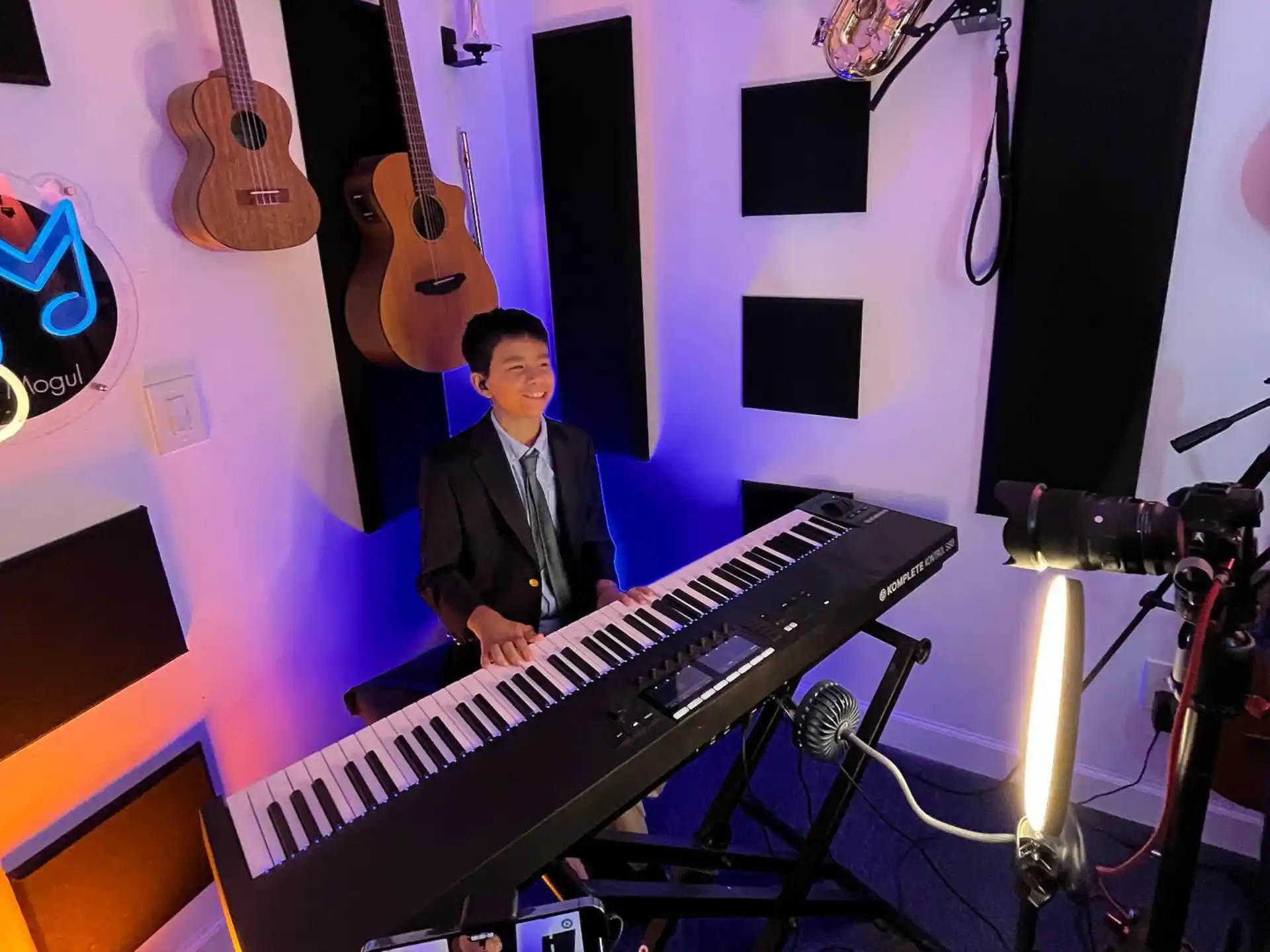 a person standing behind a keyboard