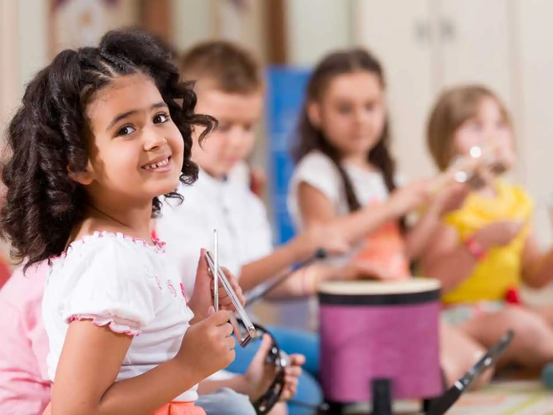 a group of children in a classroom
