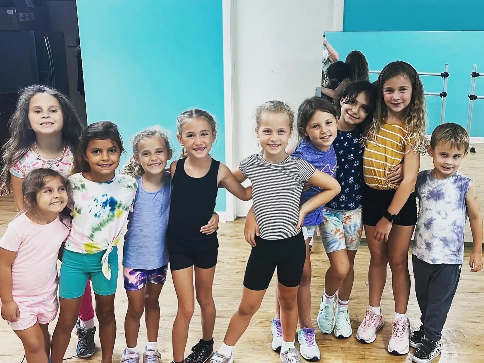 a group of girls posing for a photo