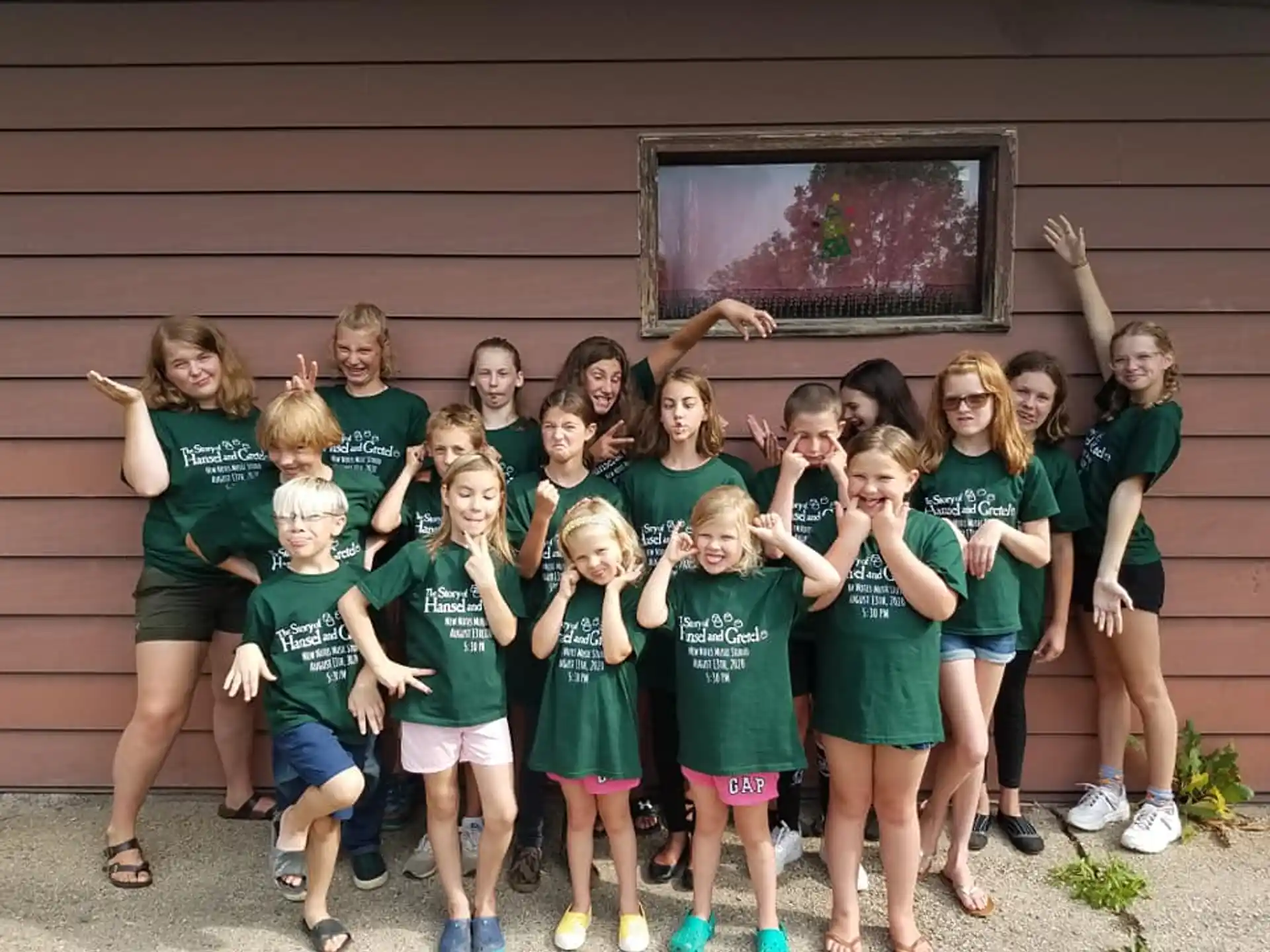 a group of girls posing for a photo