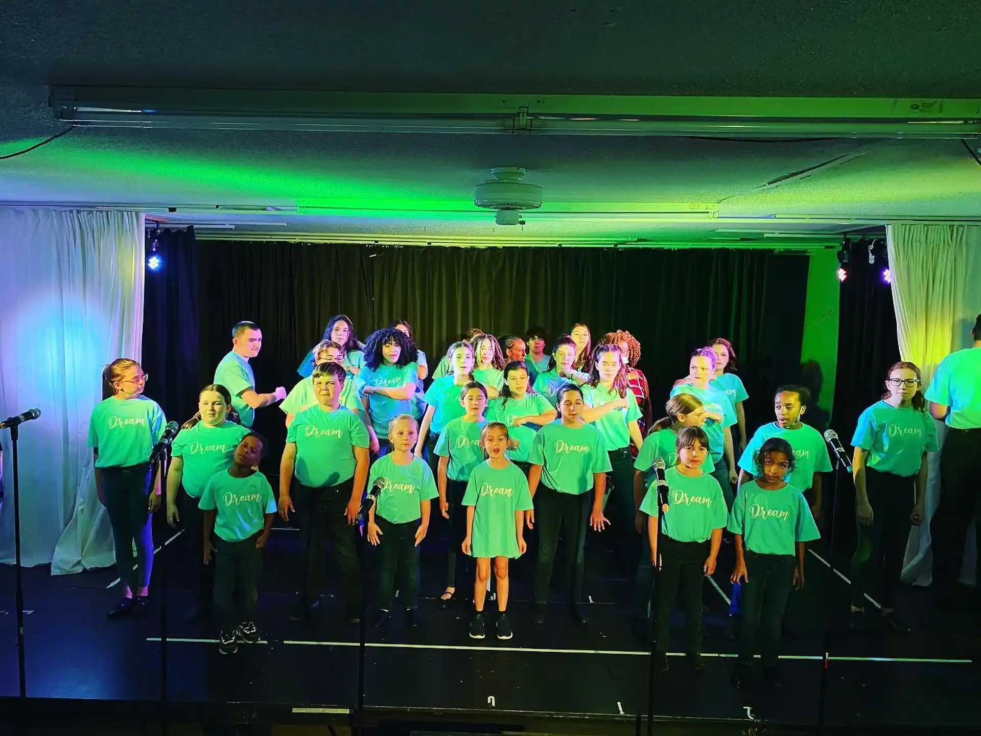 a group of people on a stage