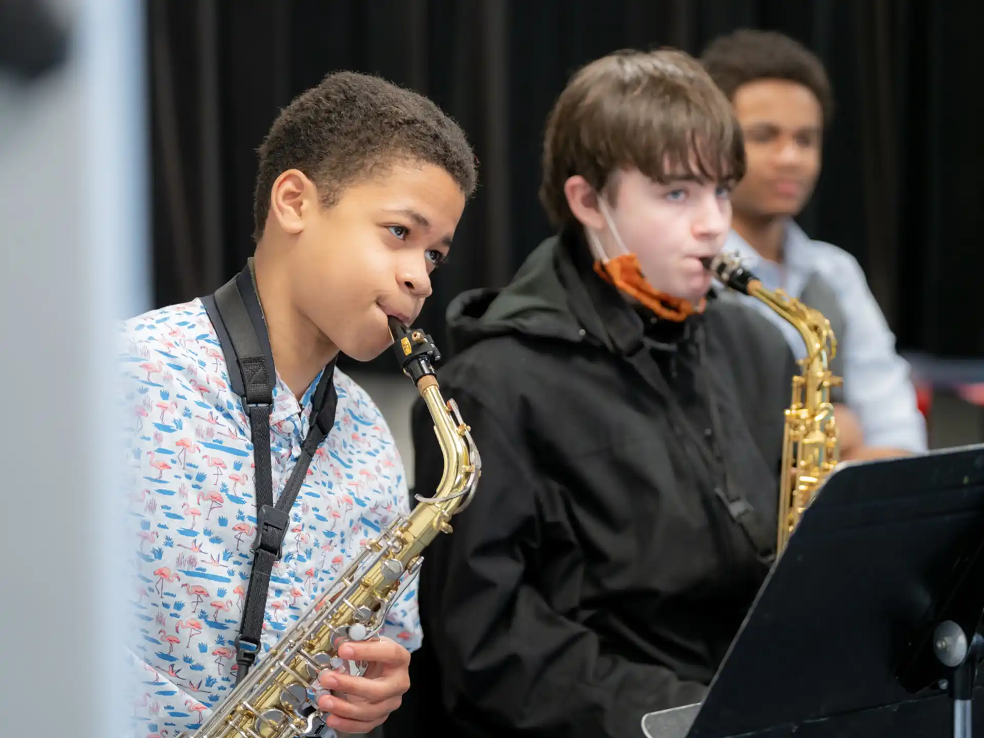 a group of boys playing instruments
