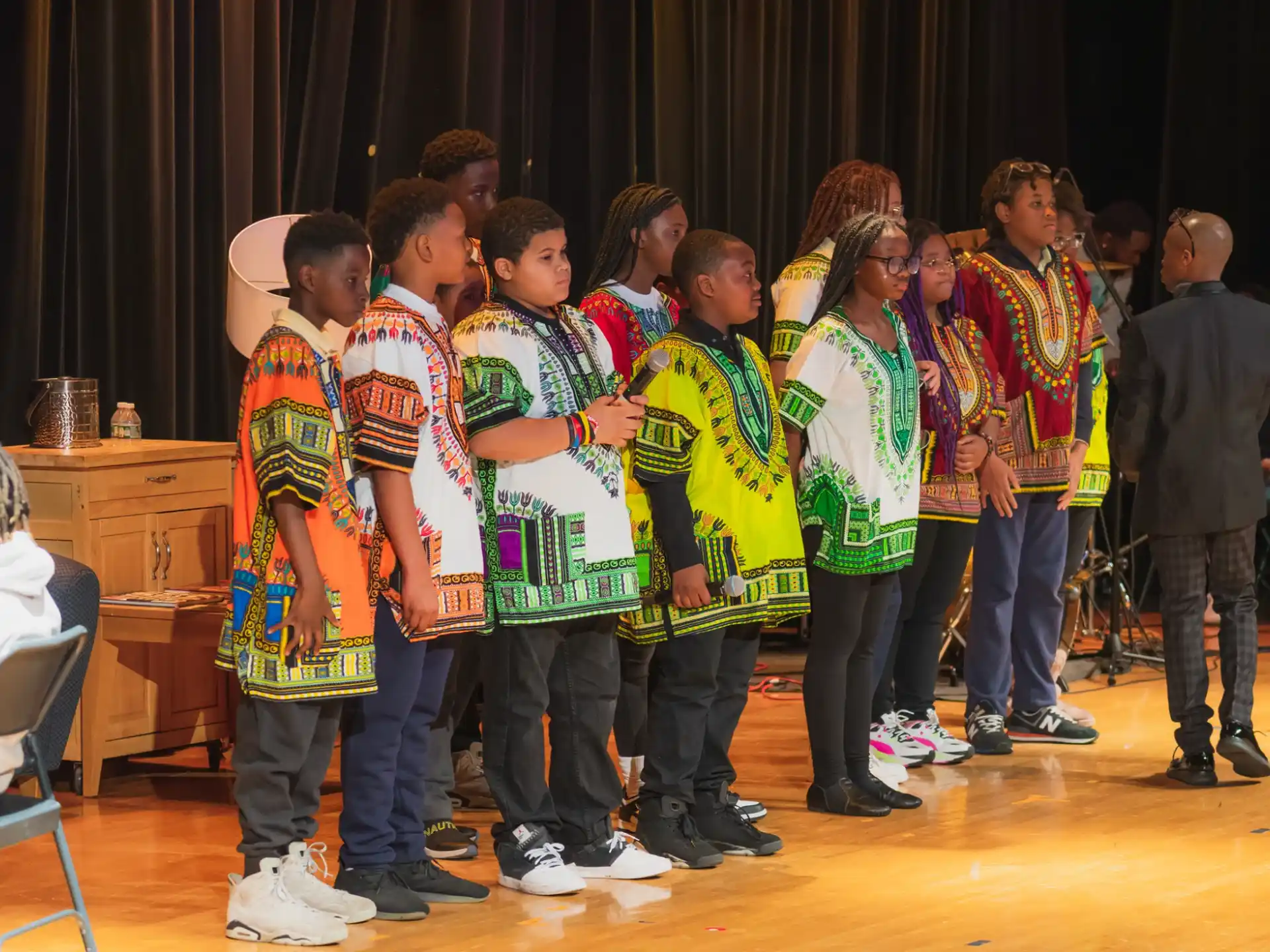 a group of people in matching outfits