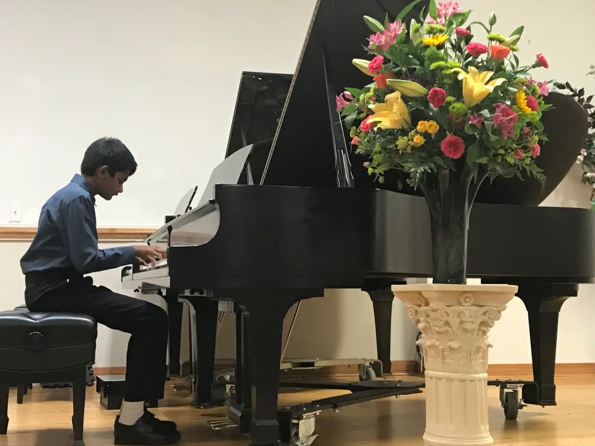 a man playing a piano