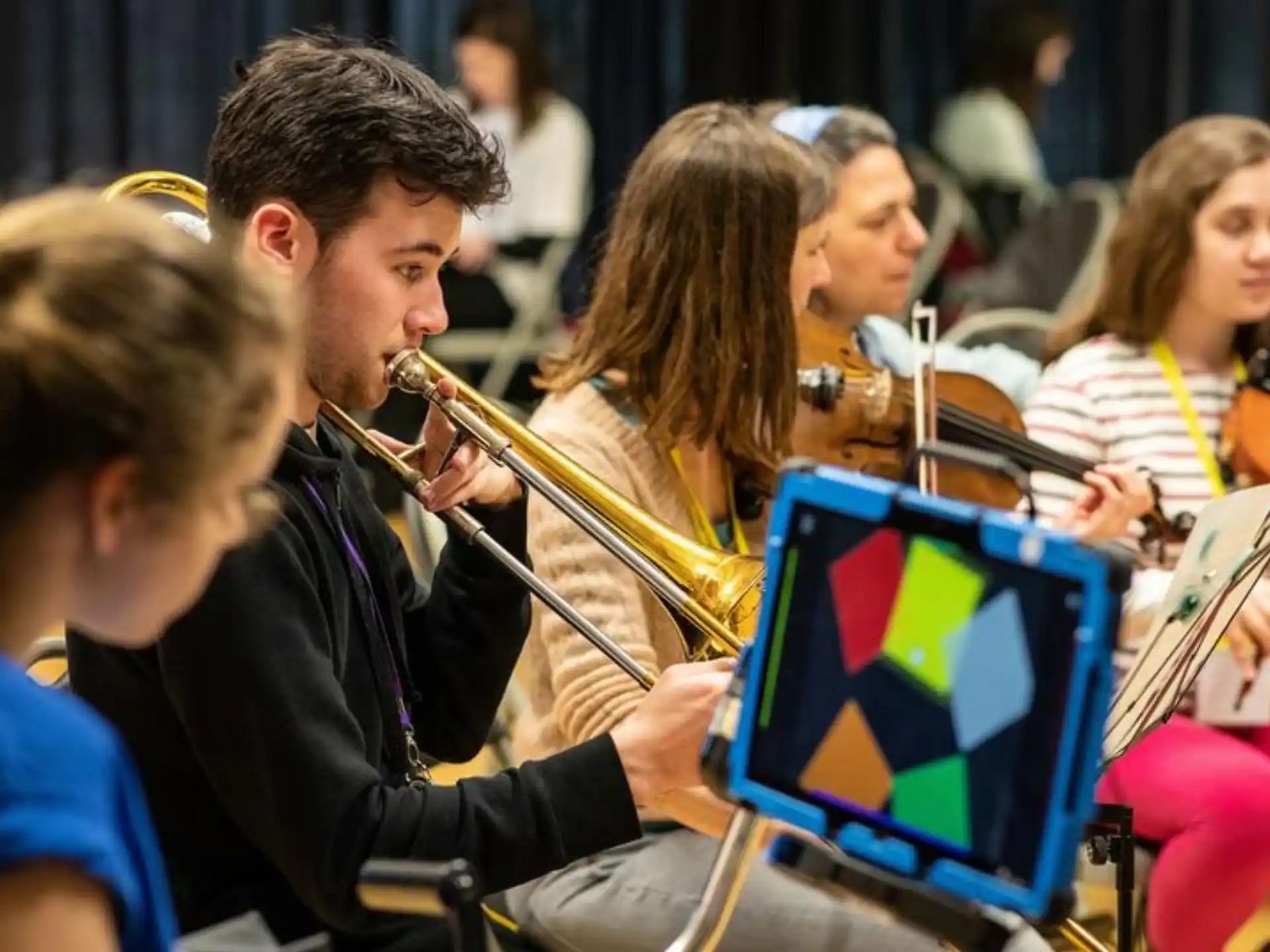 a group of people playing instruments