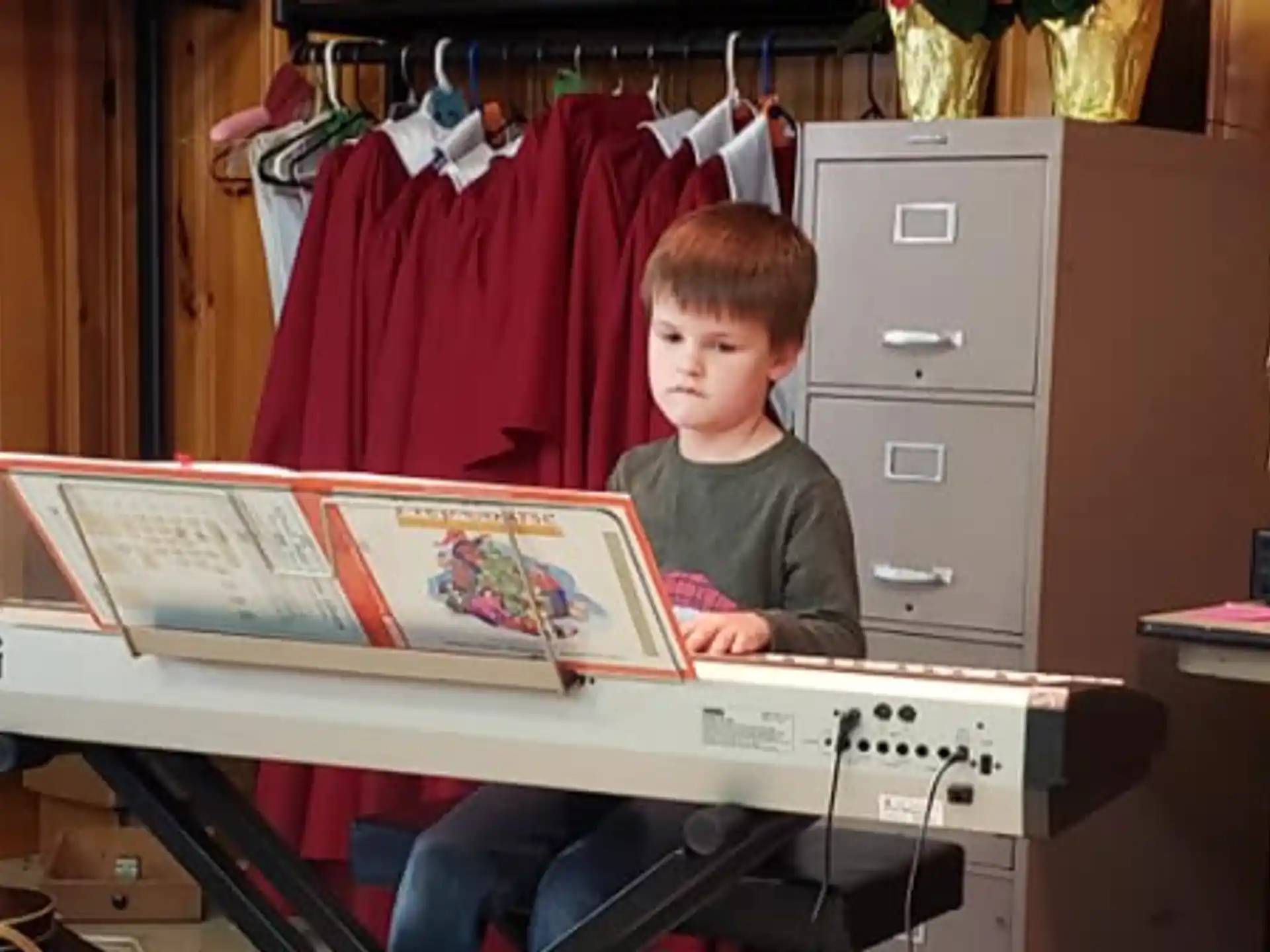 a boy reading a book
