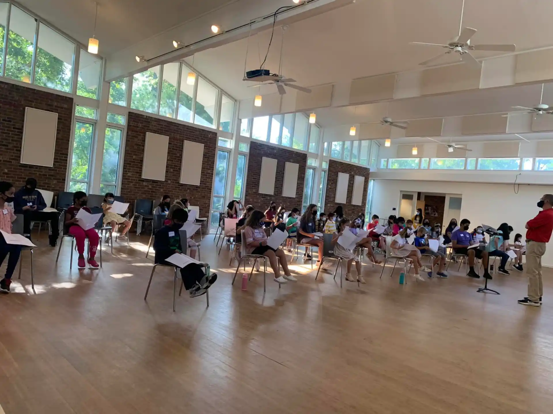 a group of people sitting in chairs