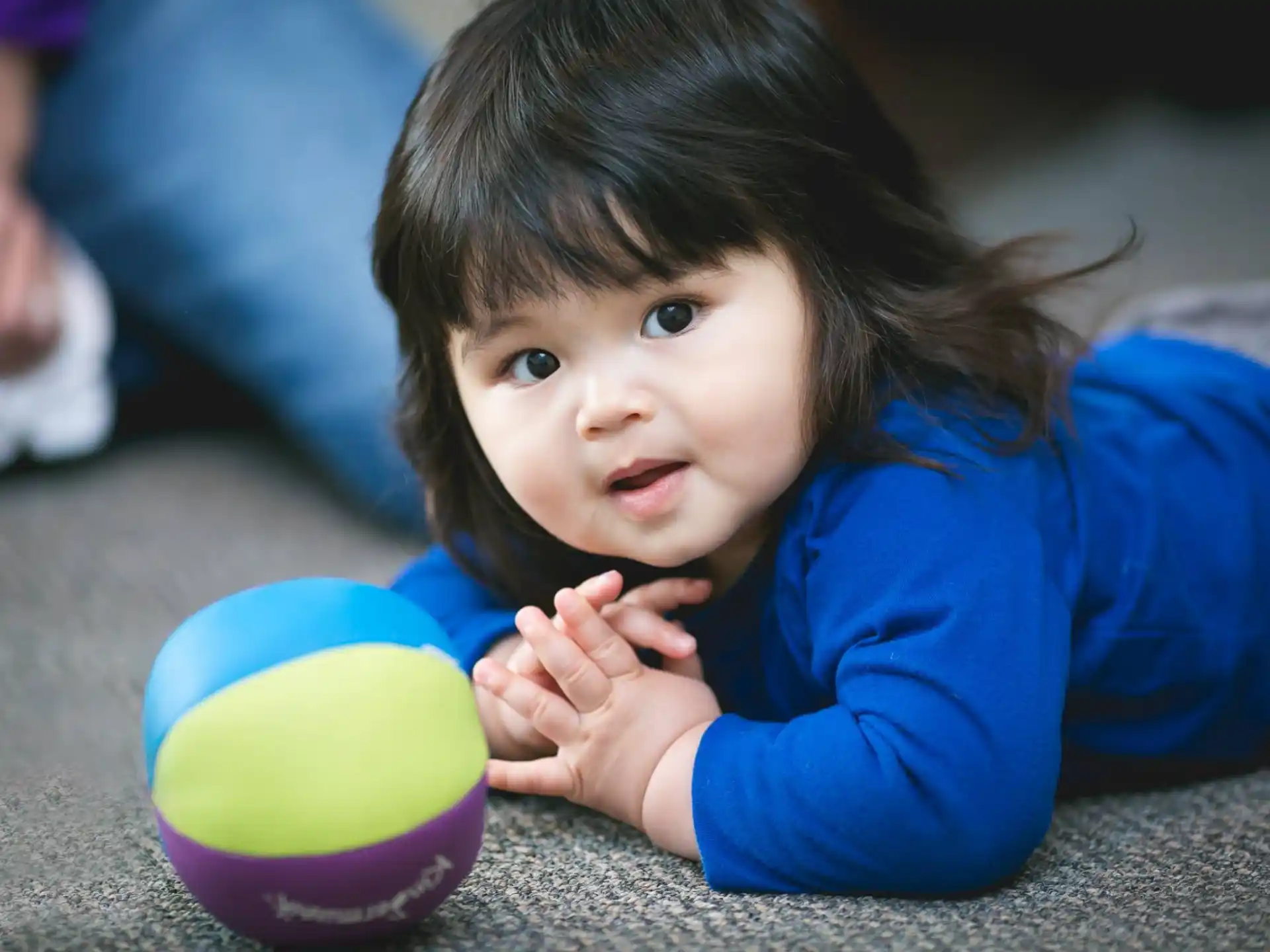 a child holding a cup