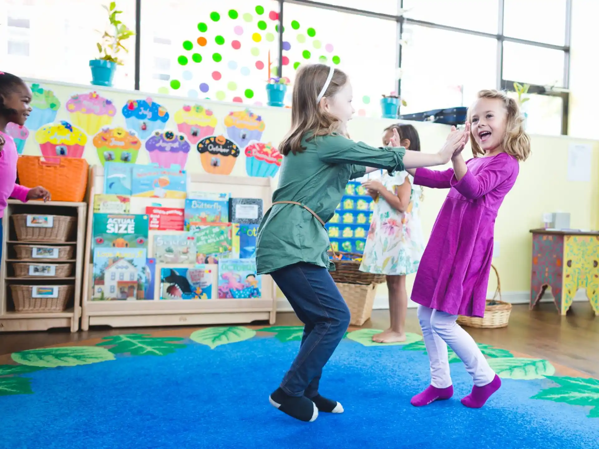 a group of children playing in a classroom