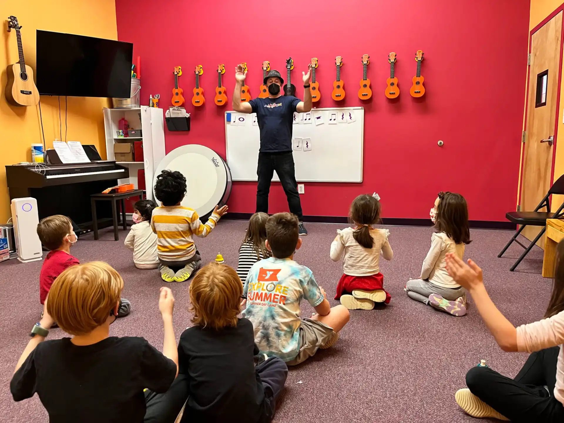 a person teaching children in a classroom