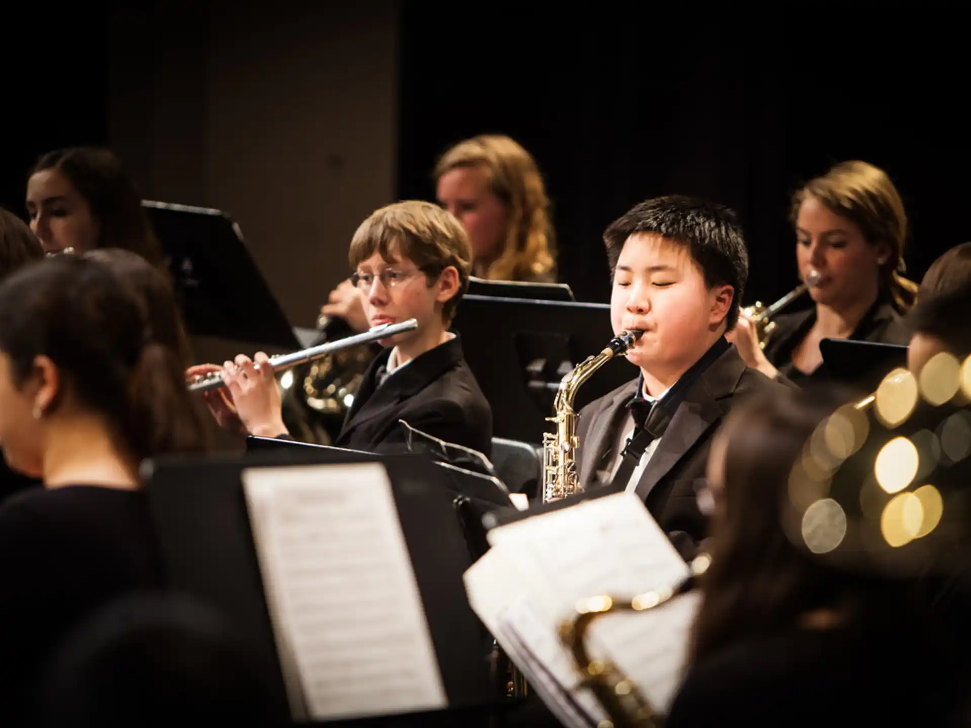a group of people playing instruments