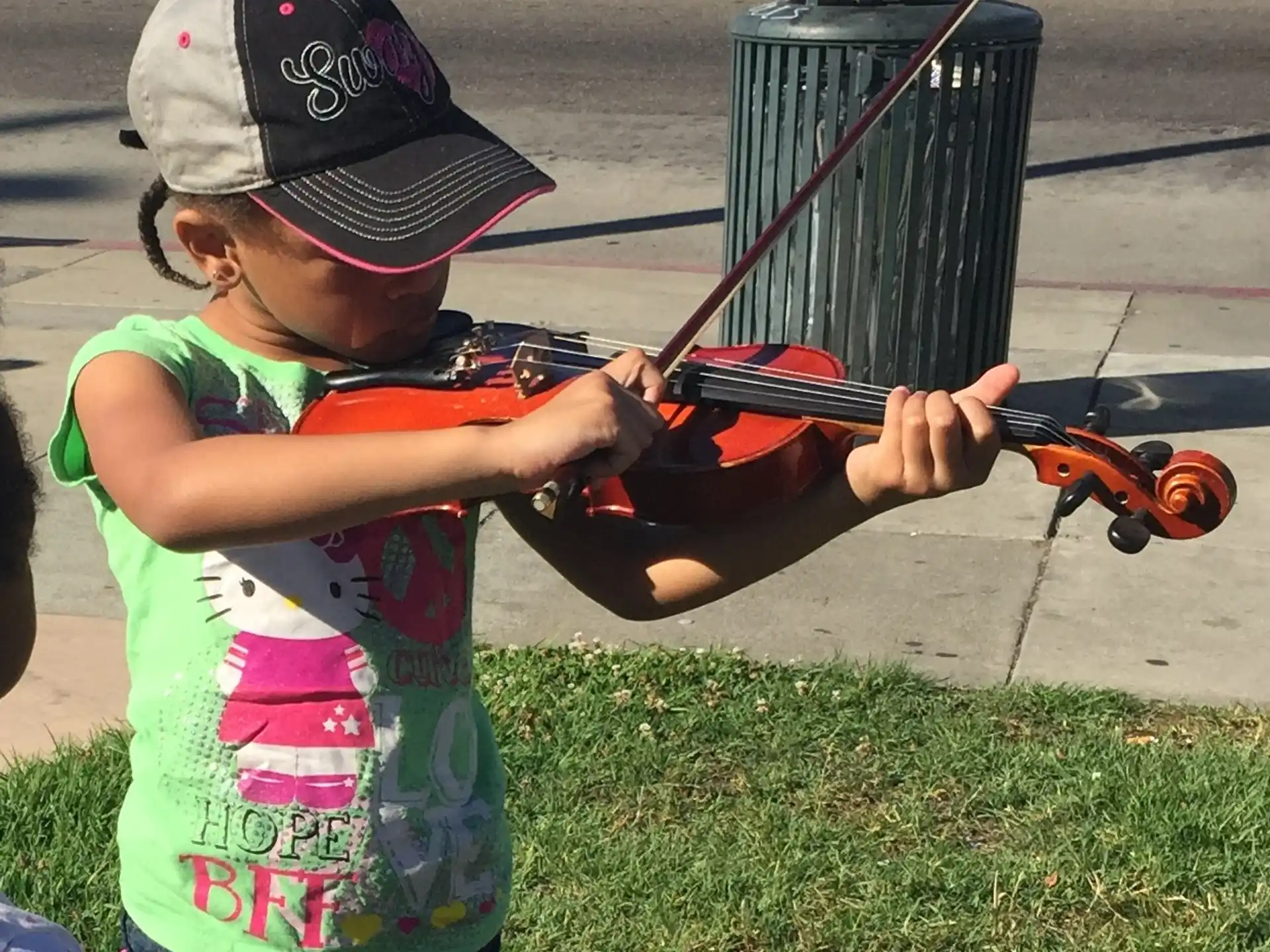 a child holding a bow and arrow