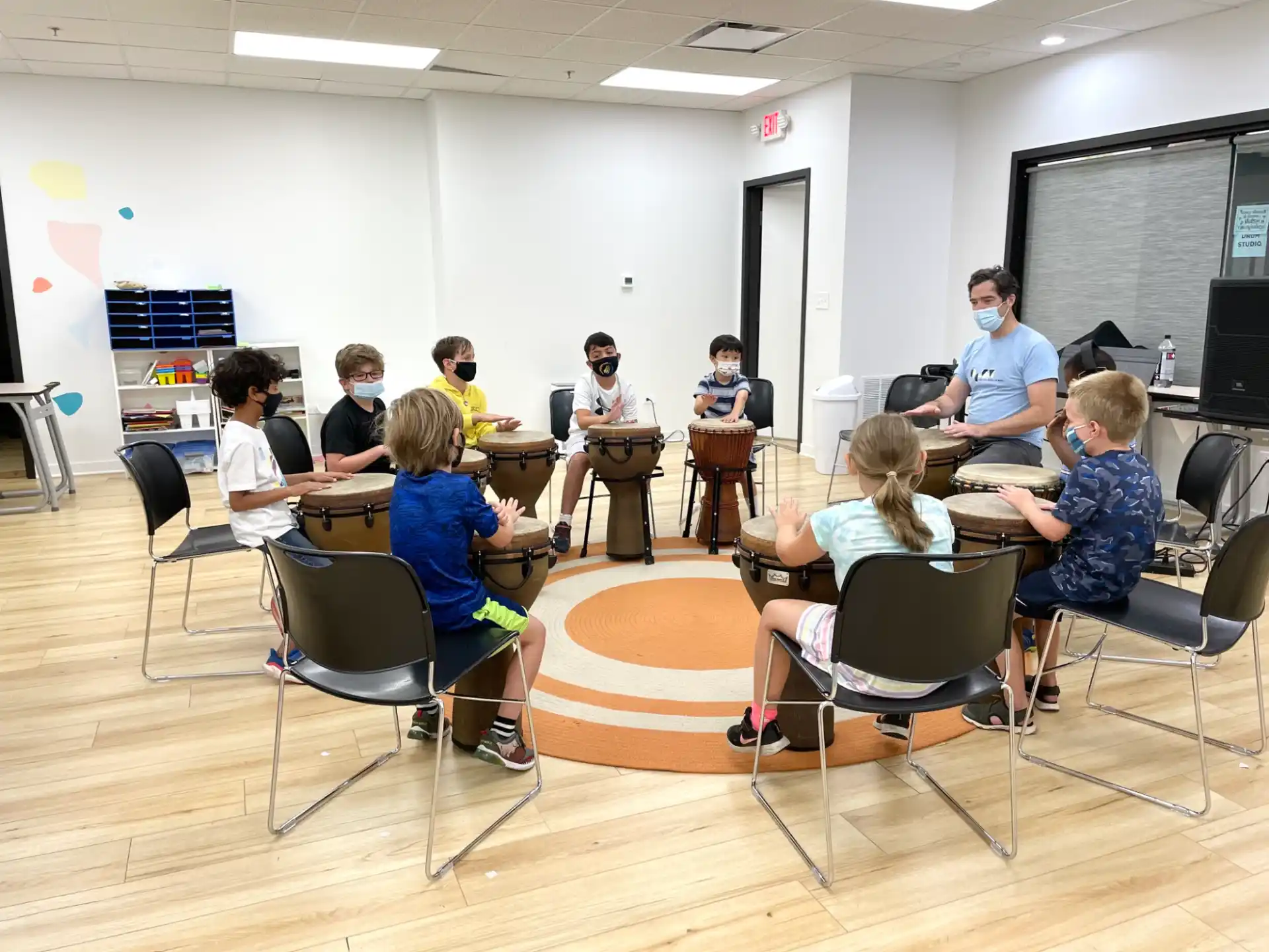 a group of people sitting in chairs