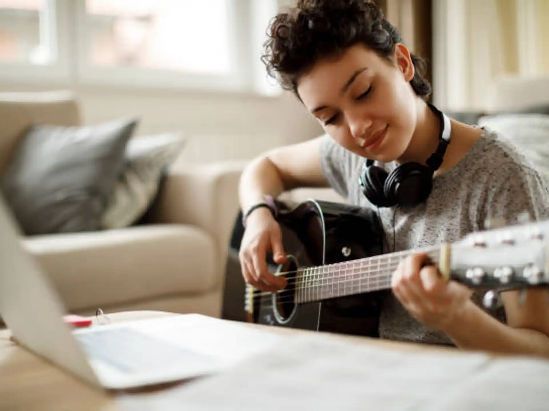 a person playing a guitar