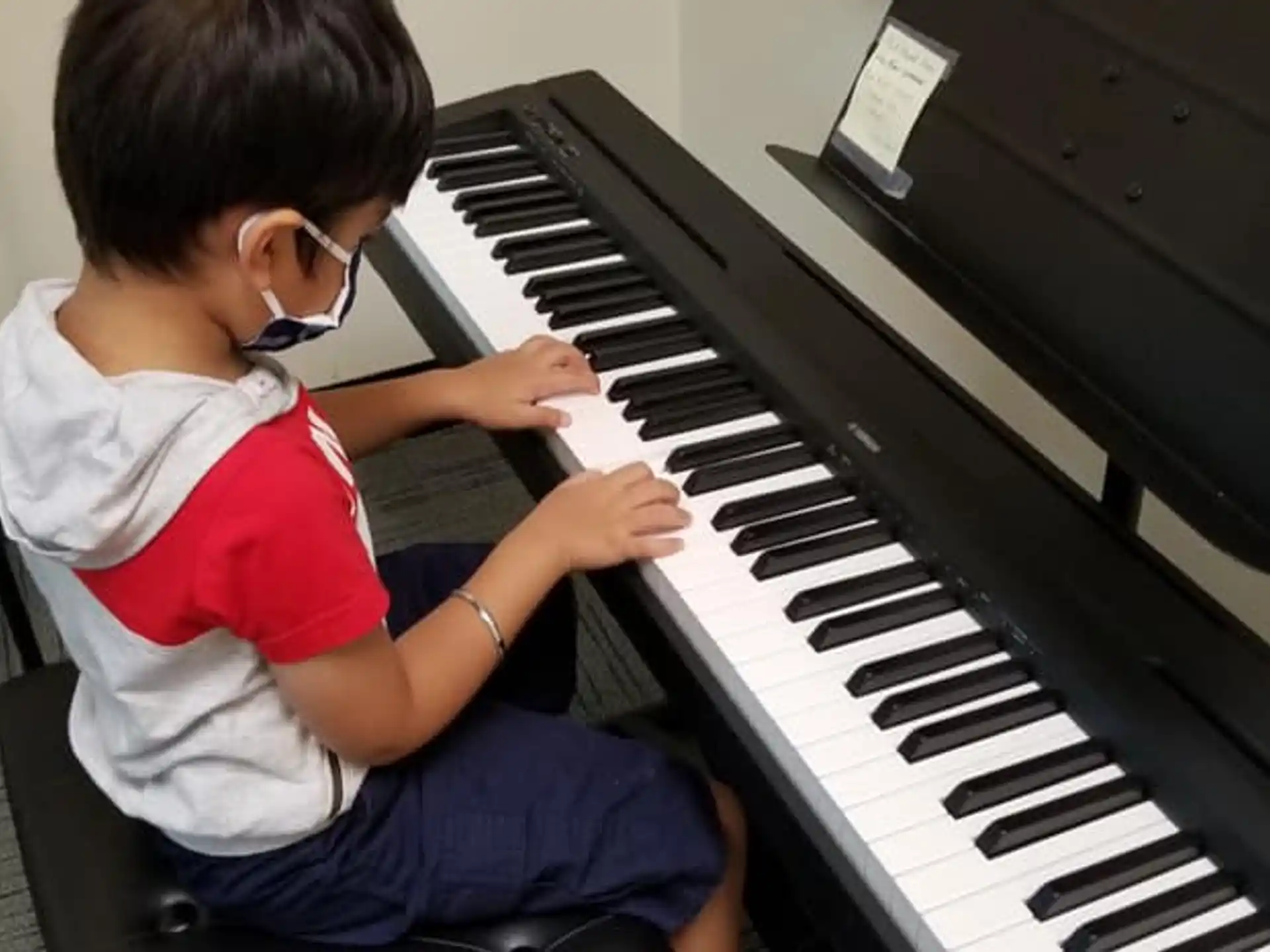 a child playing a piano
