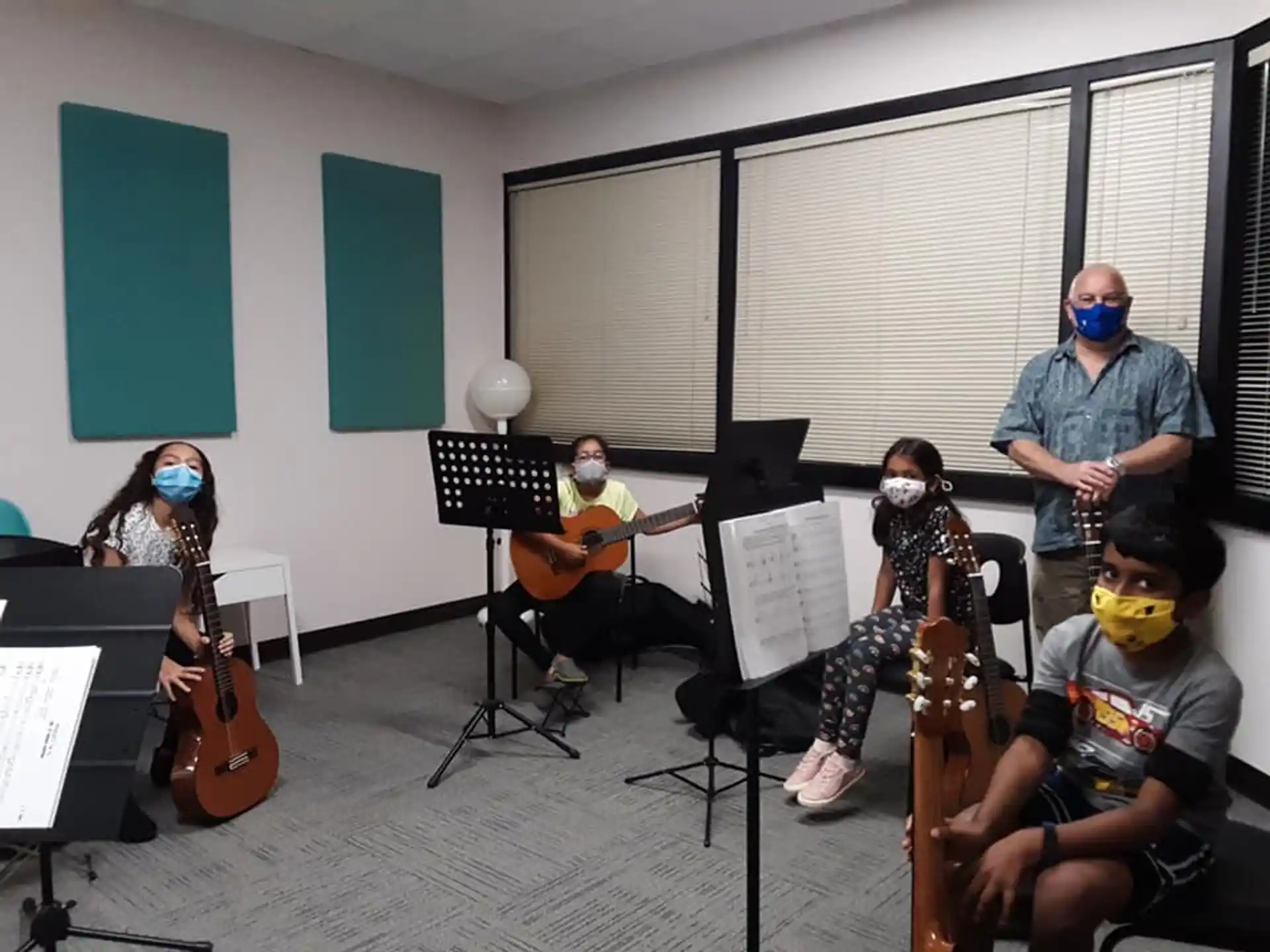 a group of people playing instruments