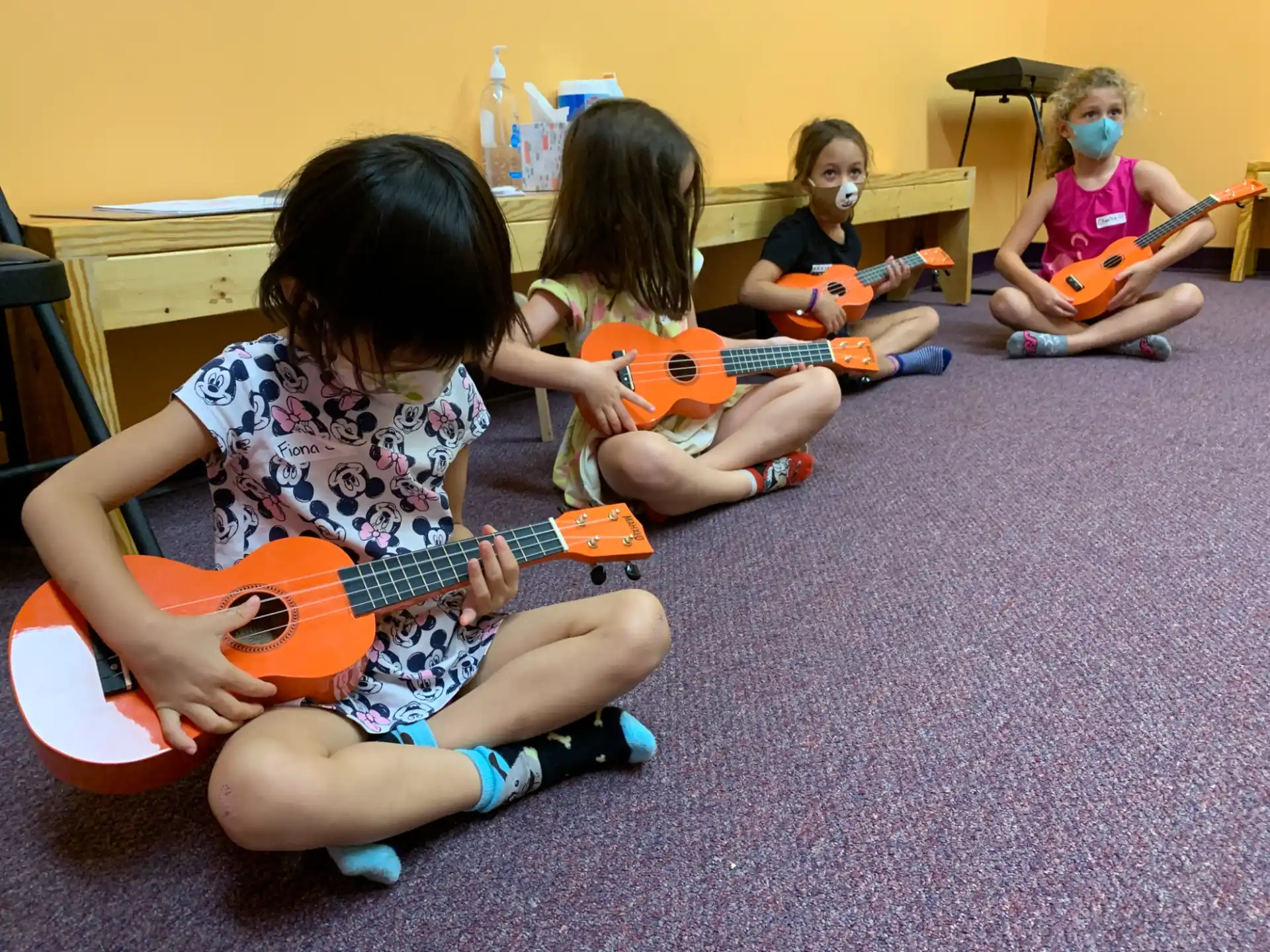 a group of children playing with toys