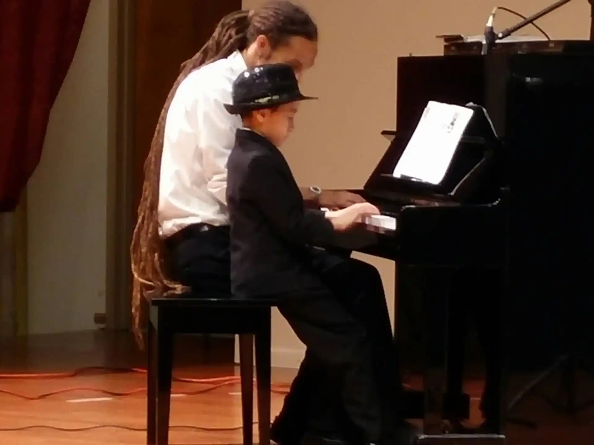 a man playing a piano