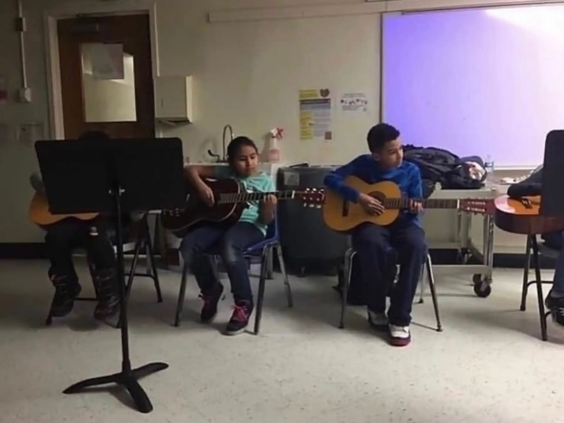 a group of people playing instruments