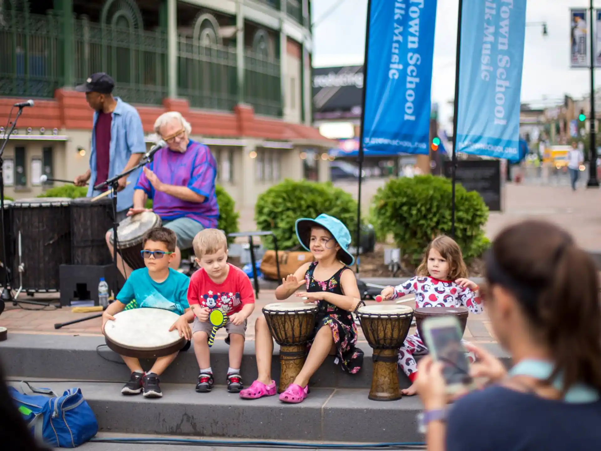 a group of people playing drums