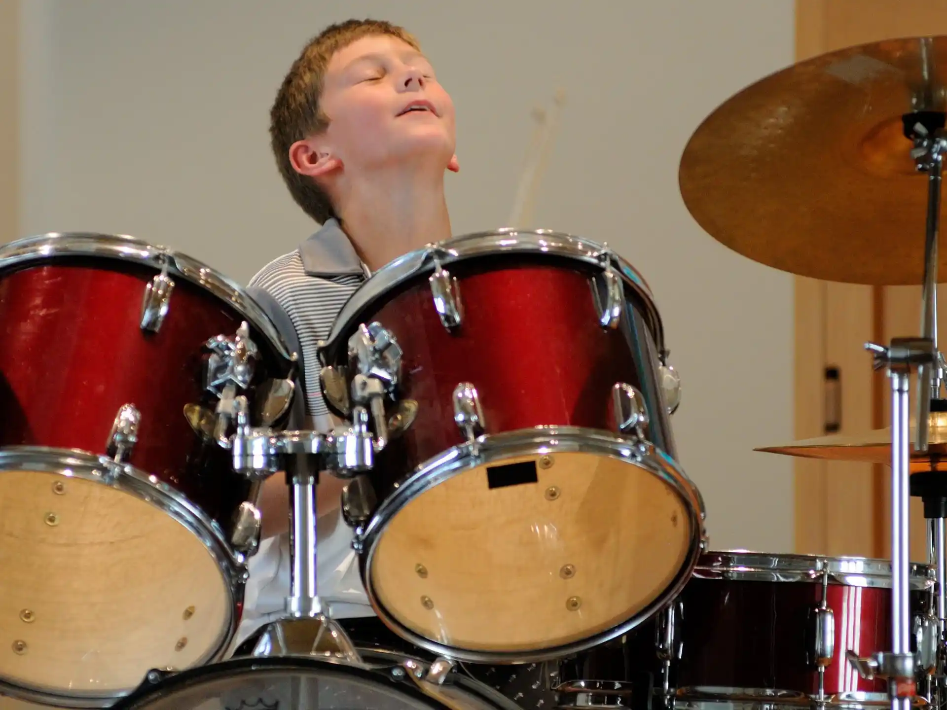 a person playing a drum set