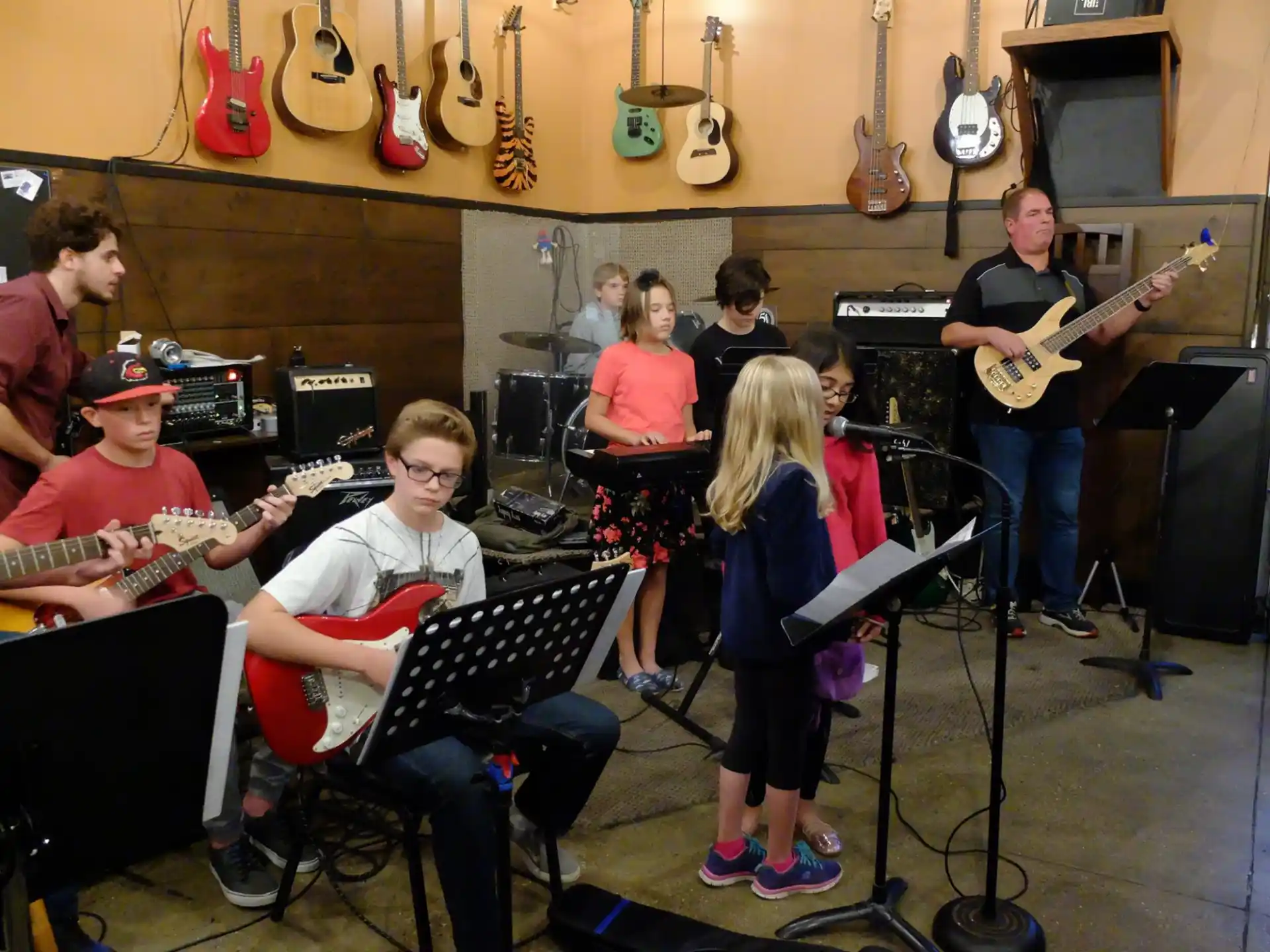 a group of people playing instruments