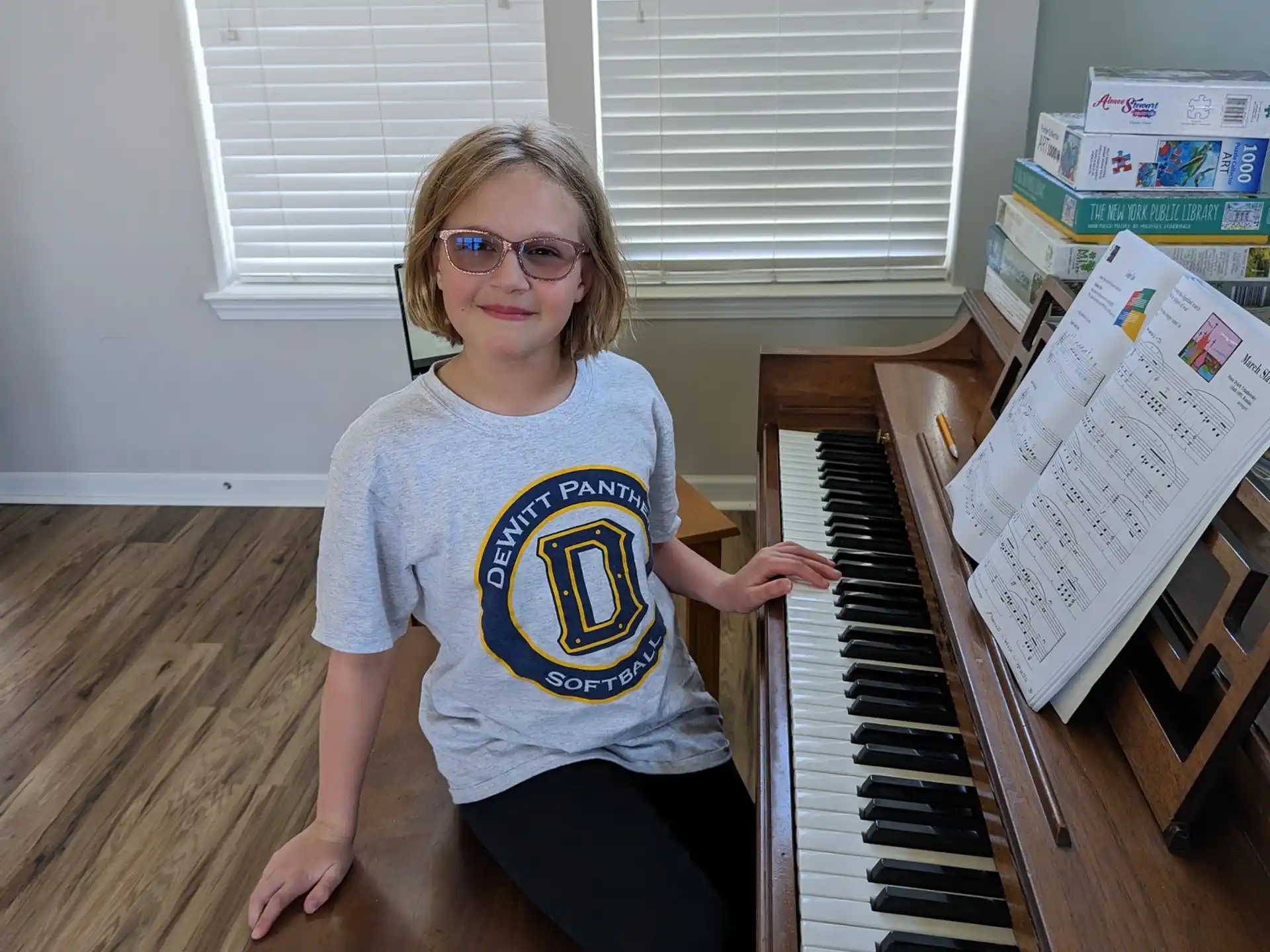 a person sitting at a piano