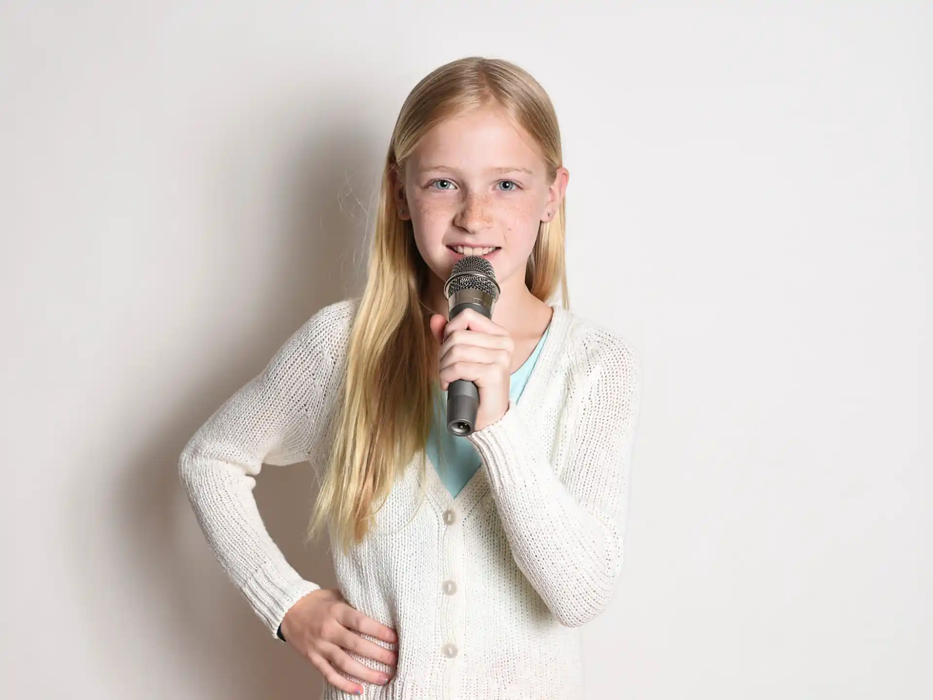a woman holding a microphone