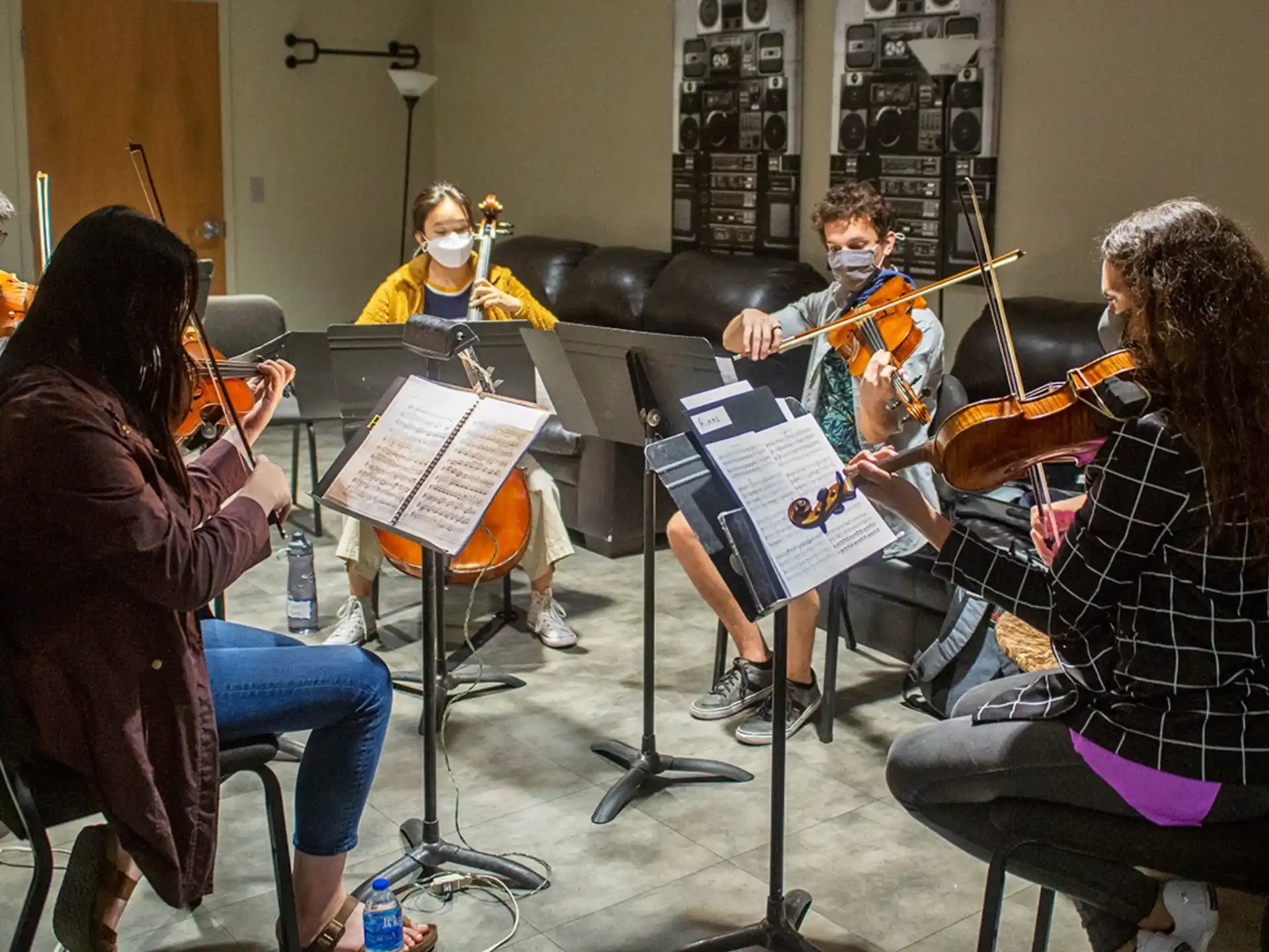 a group of people playing instruments