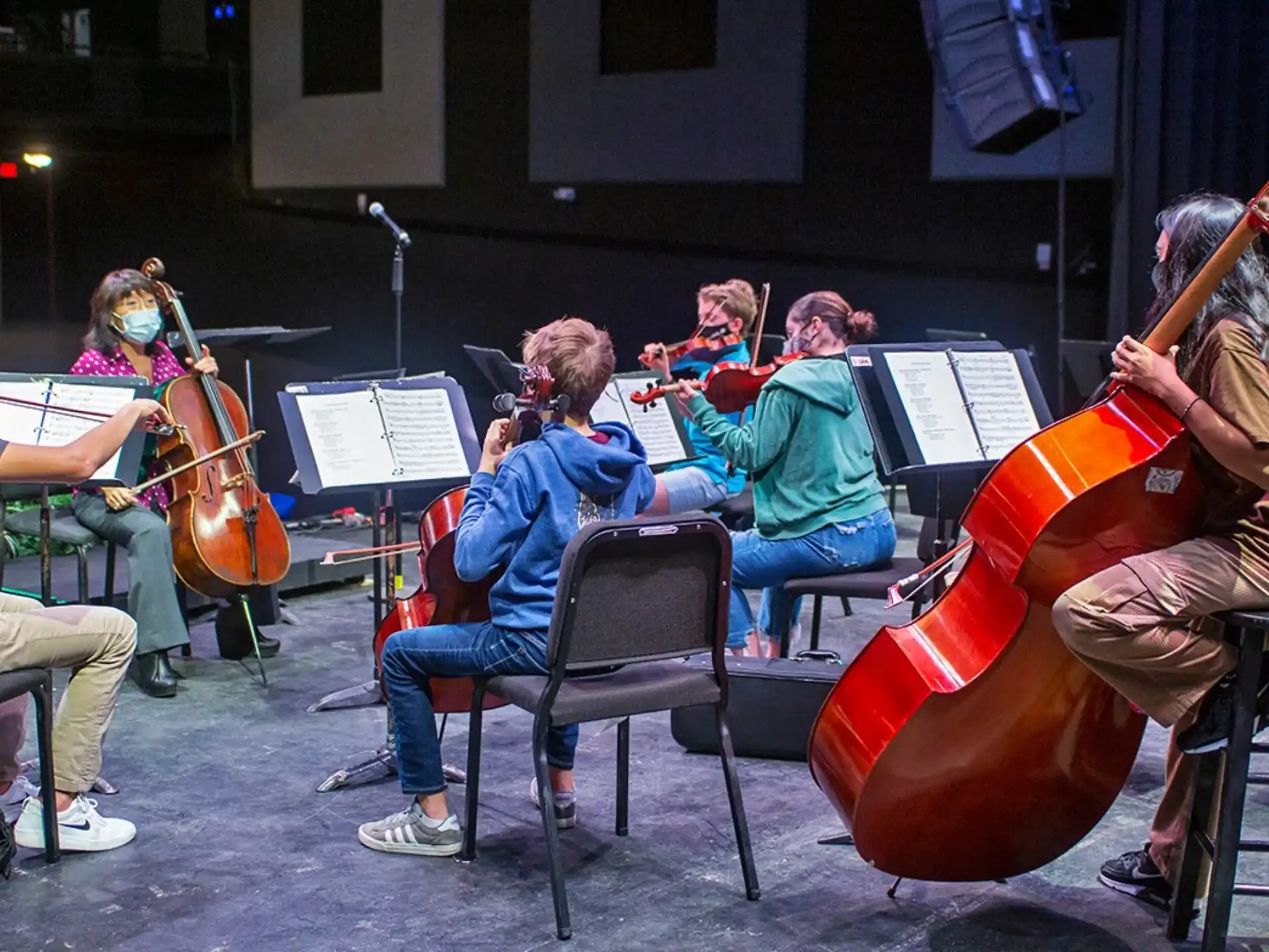 a group of people playing instruments
