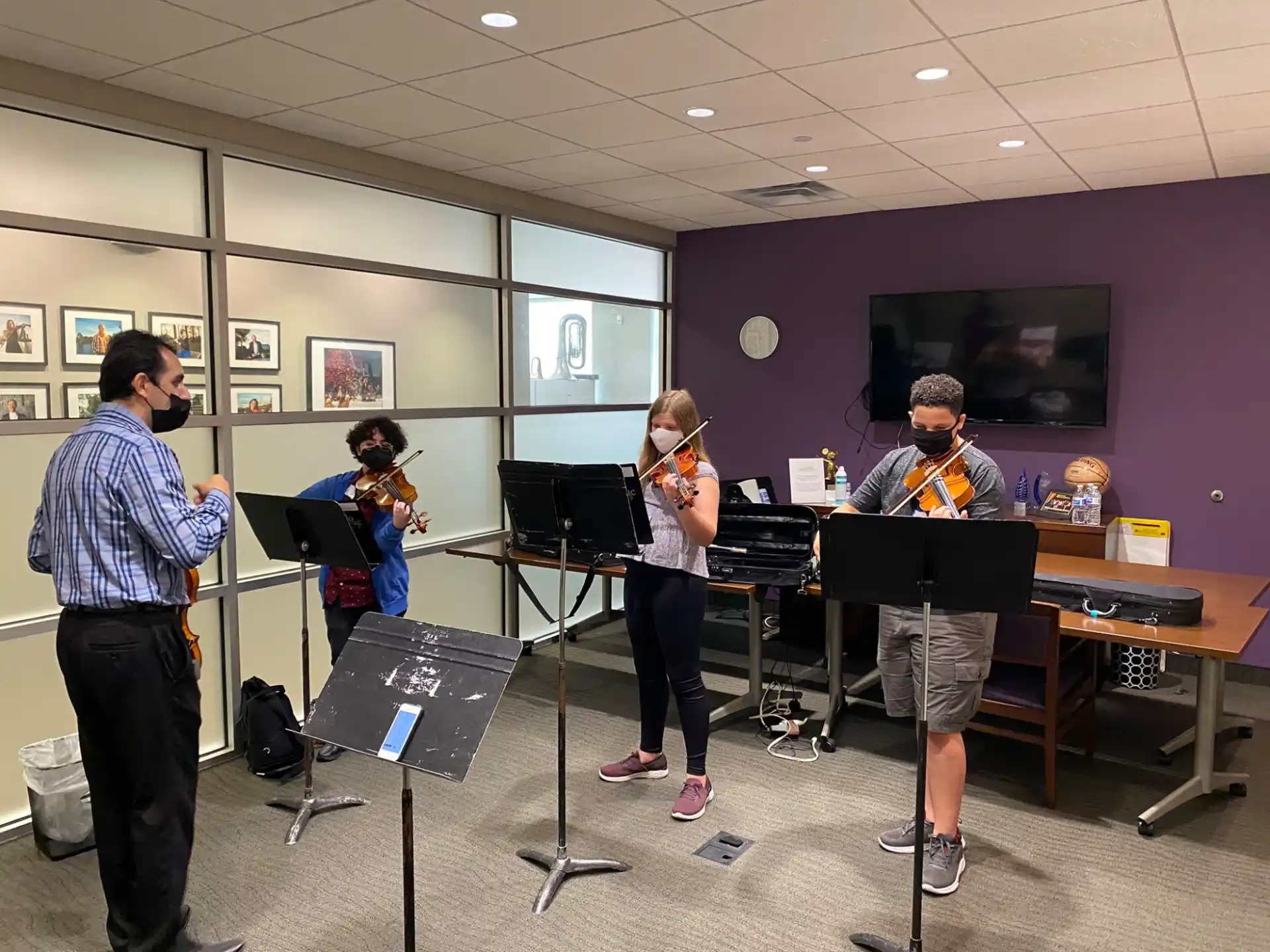 a group of people playing instruments