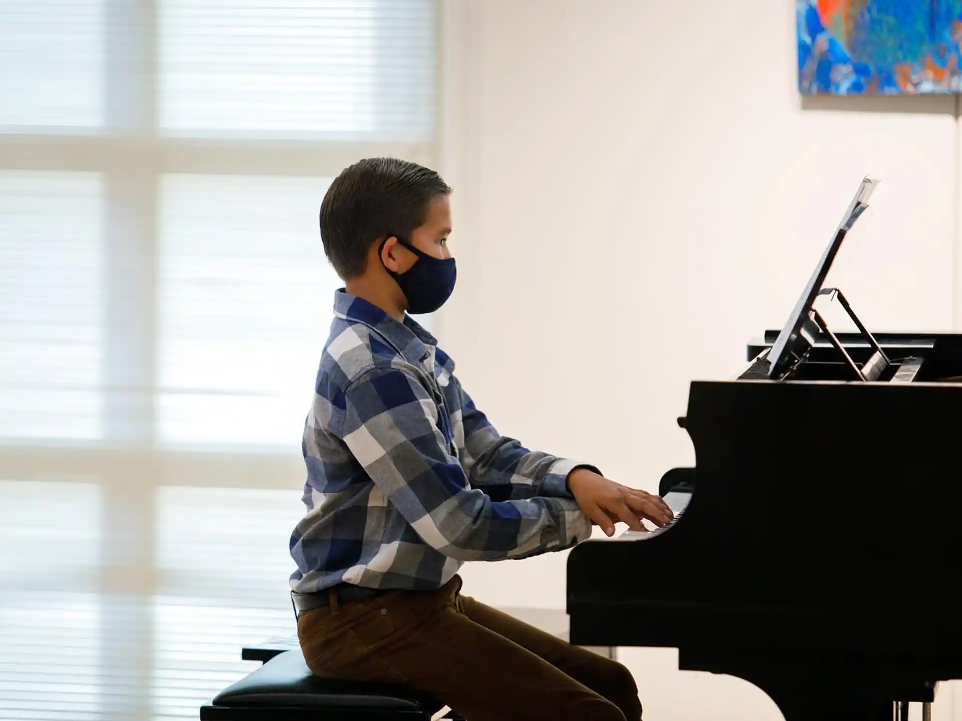 a man playing a piano
